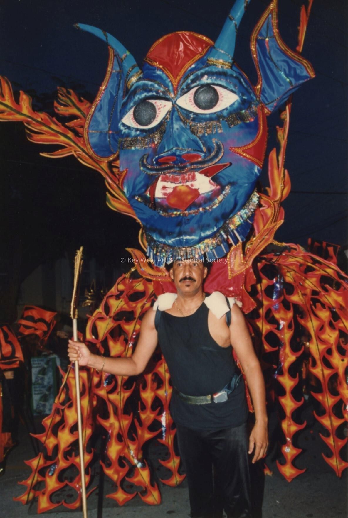 An unknown man dressed up.