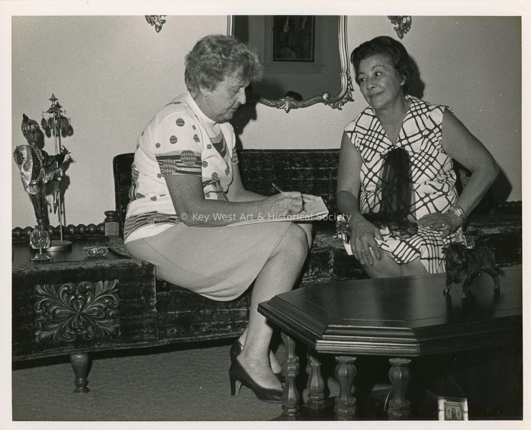 2 Unknown woman sitting talking