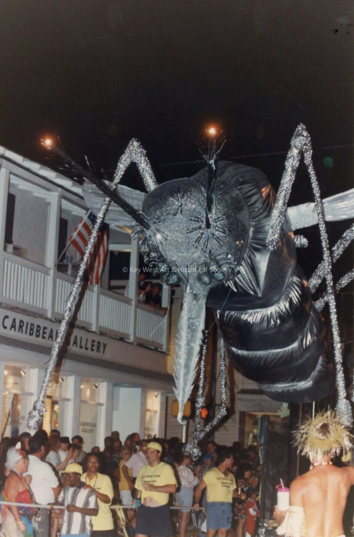 A huge bug float in front of the Caribbean Gallery.