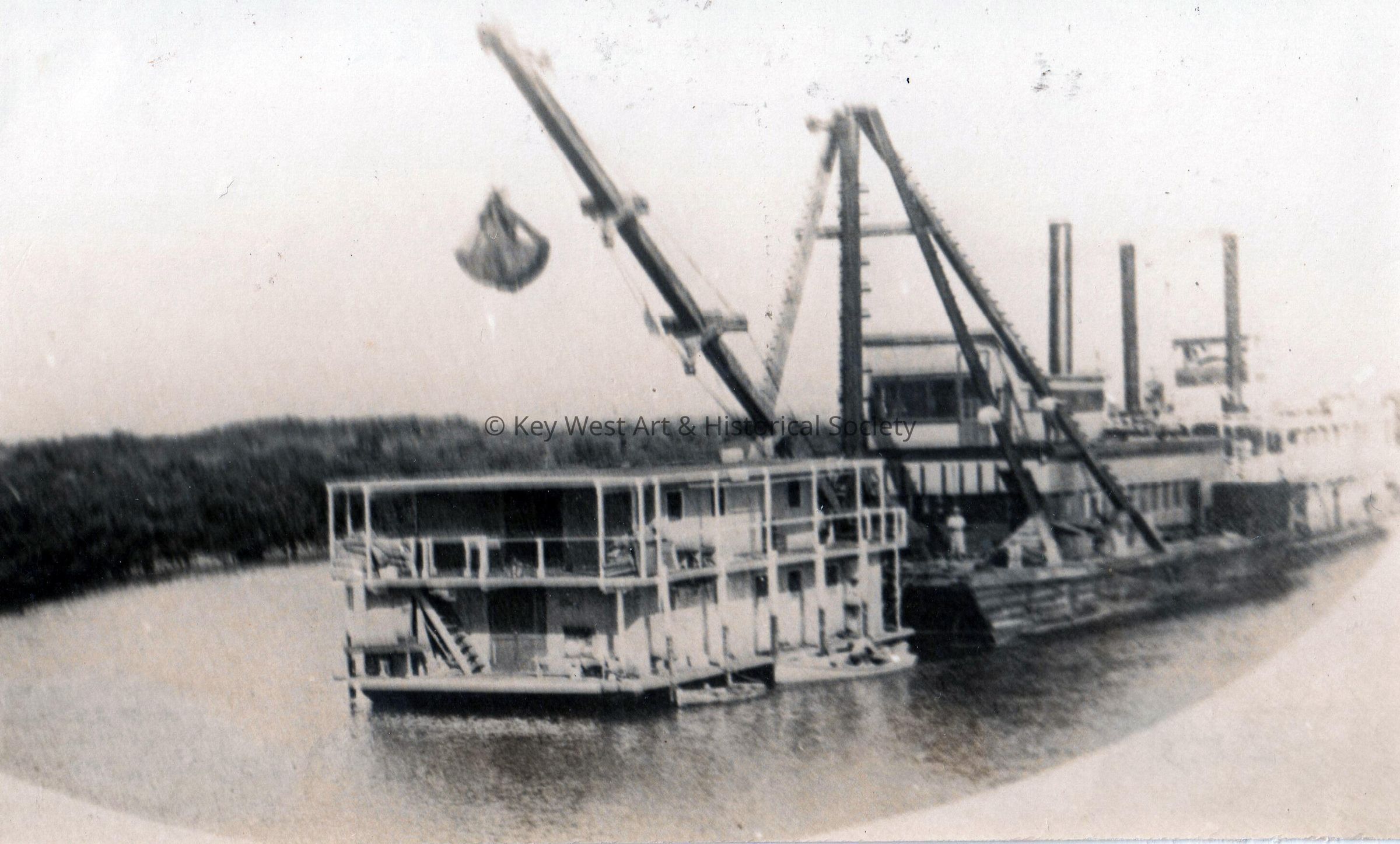 Houseboat and crane barge used in constructing the railroad picture number 1