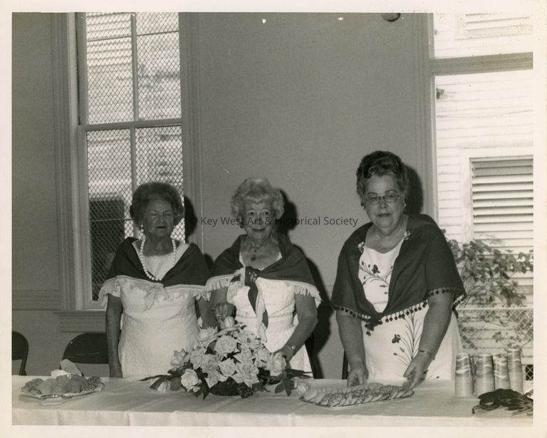 3 Unknown woman at a party