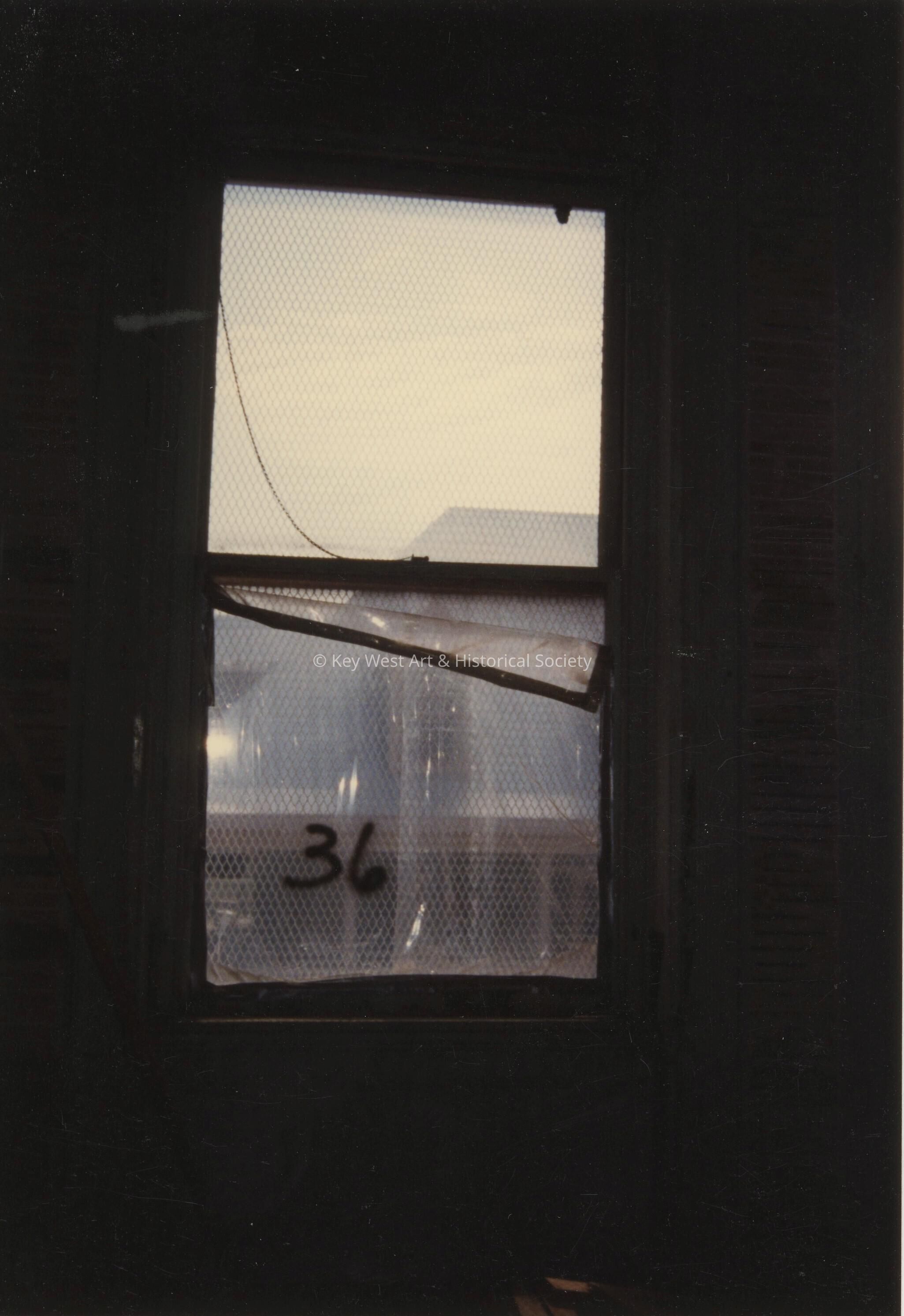 A window labeled number 36.