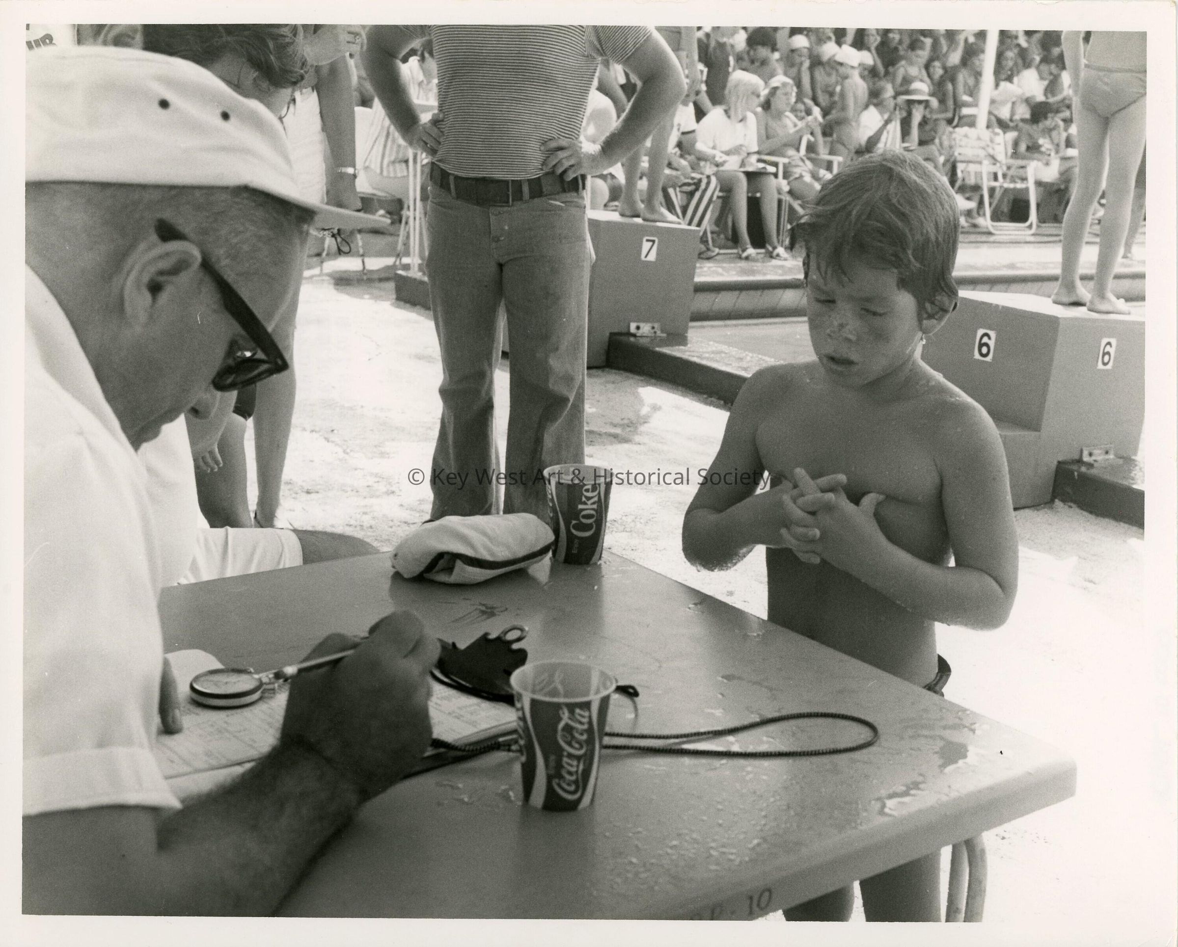 An unknown group of people at a pool