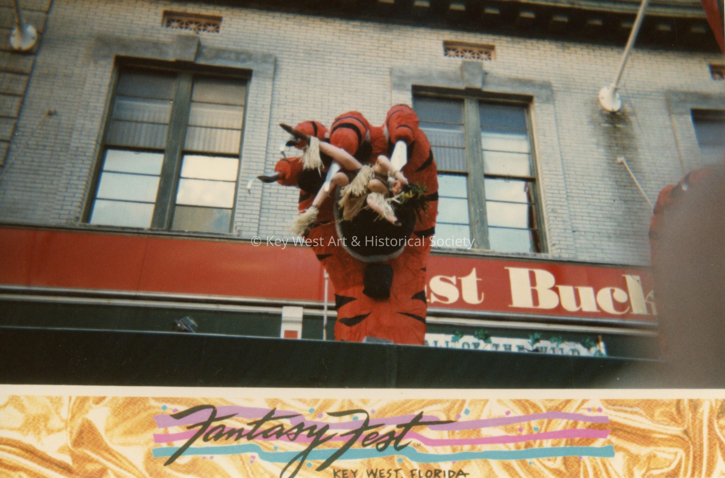 A tiger paw on the roof of  Fast Buck Freddie's.