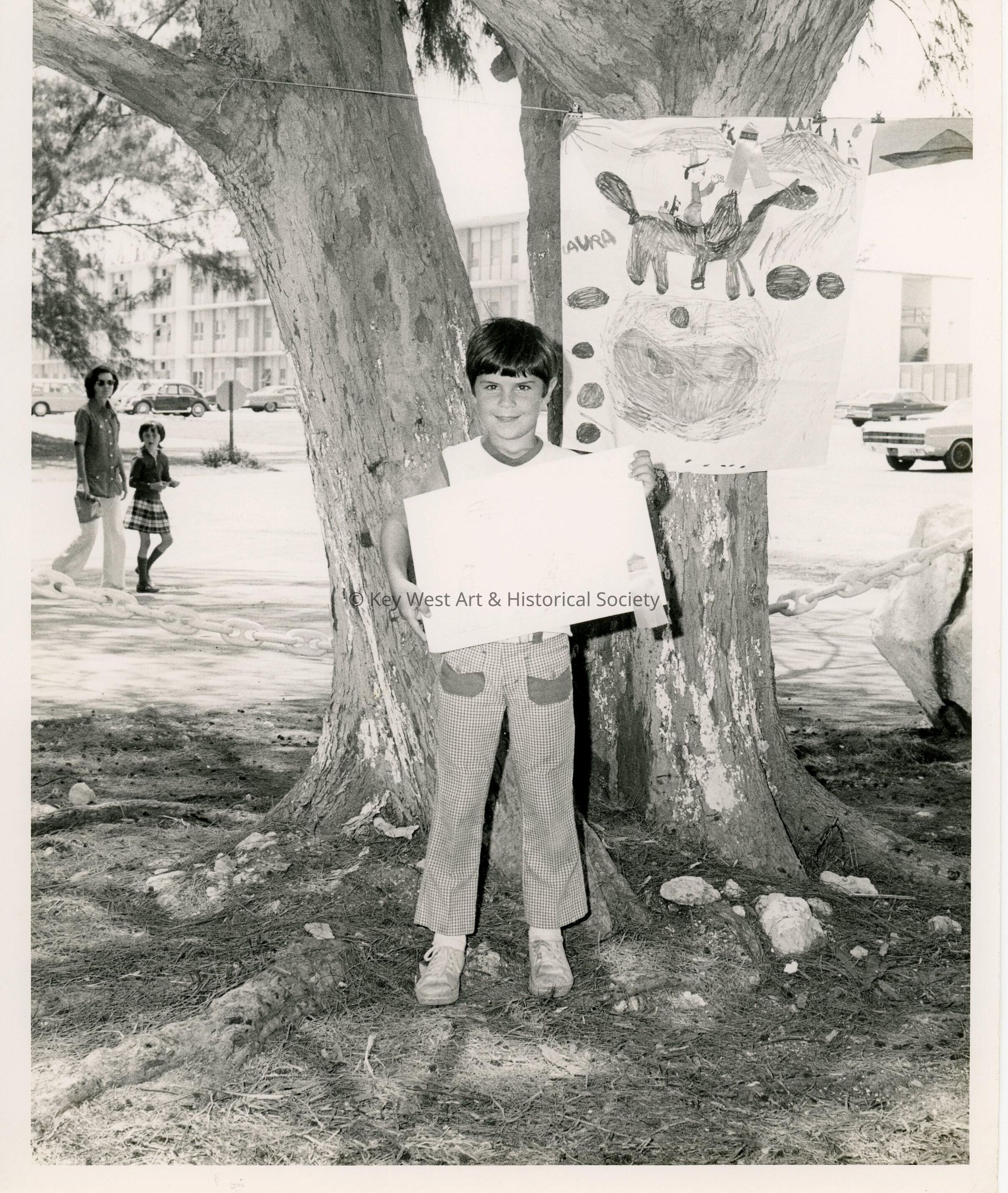 An unknown child showing some artwork