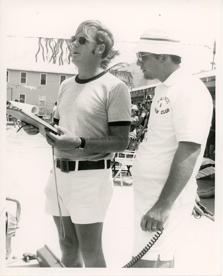 2 Unknown men at the pool