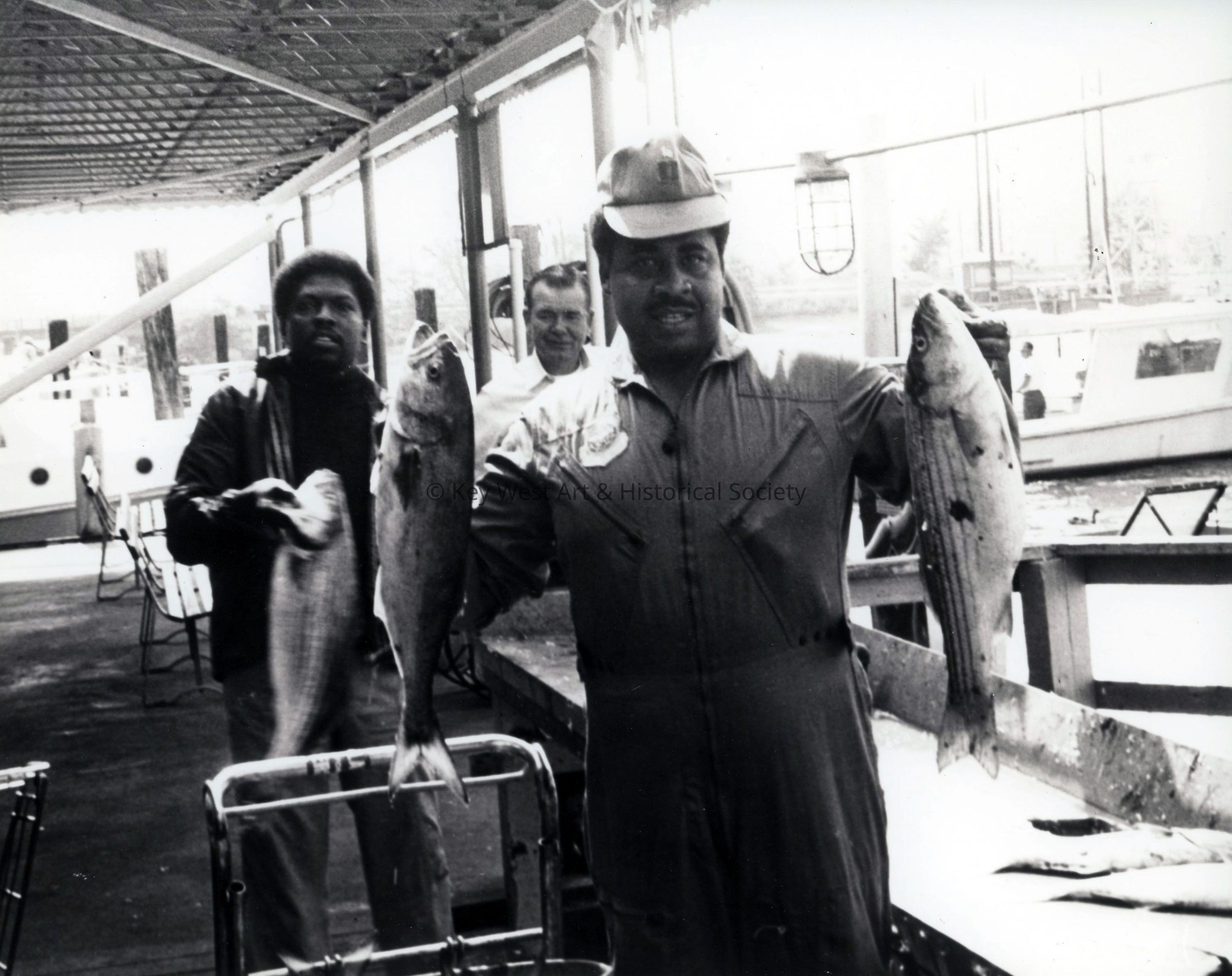 Fishermen Displaying their Catch; © Key West Art & Historical Society