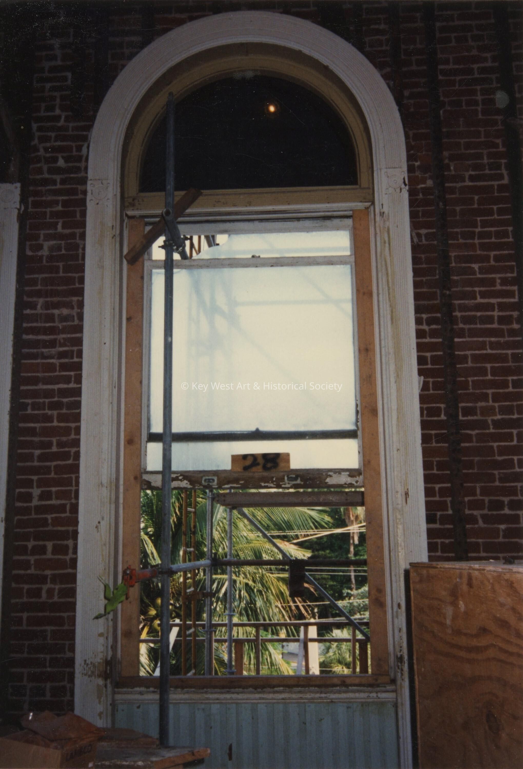 A window labeled number 28.