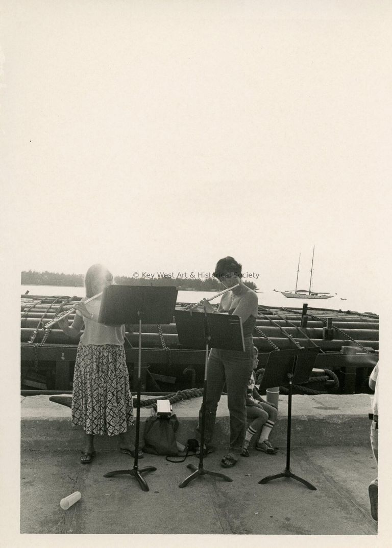 2 Unknown woman playing flutes