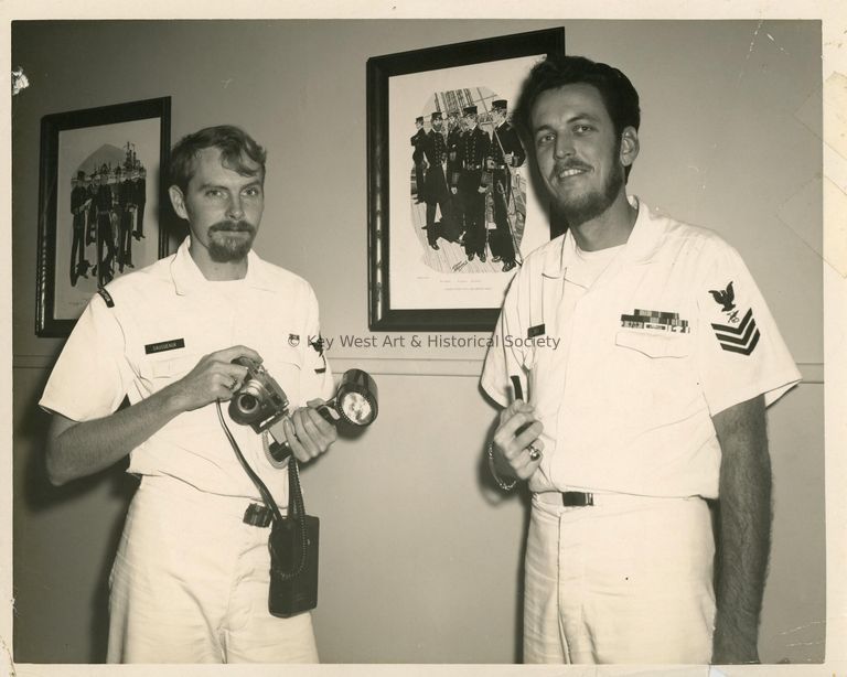 2 Unknown men in uniform