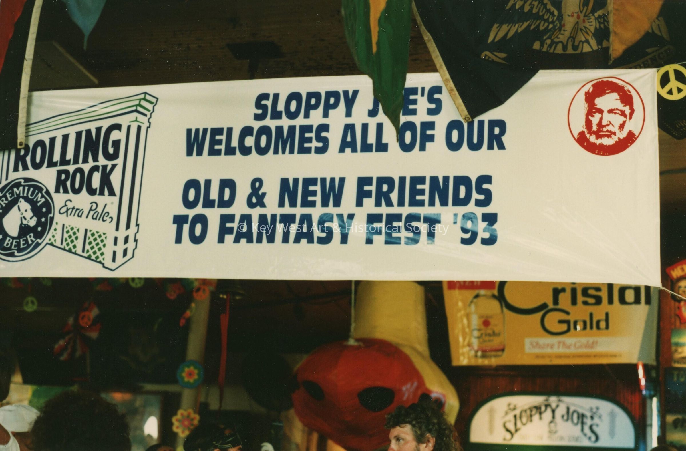A sign that reads Sloppy Joe's welcomes all of our old and new friends to F