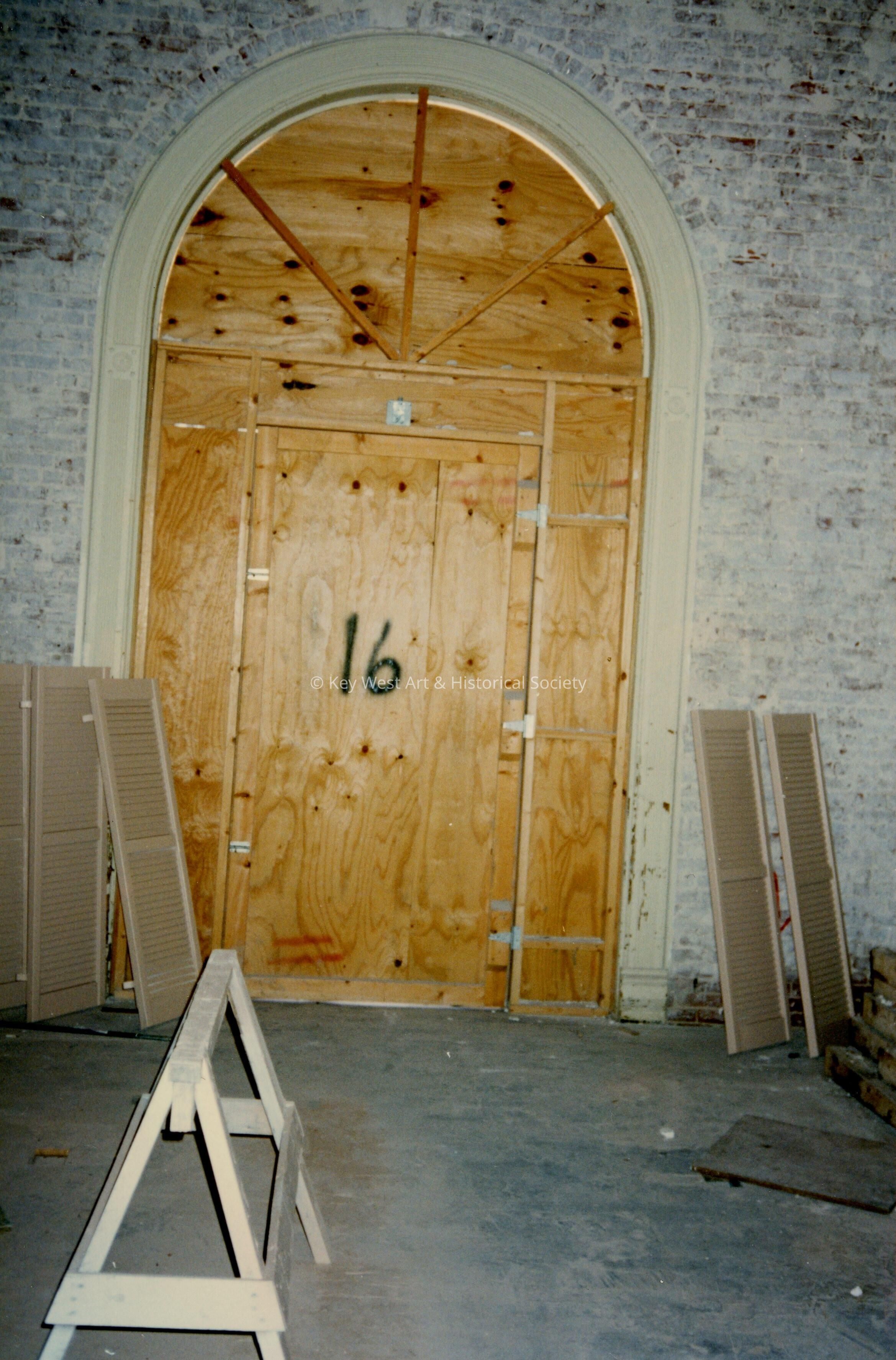 A door labeled number 16.