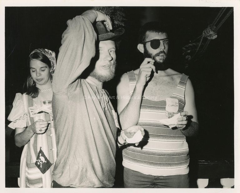 3 Unknown people at a party