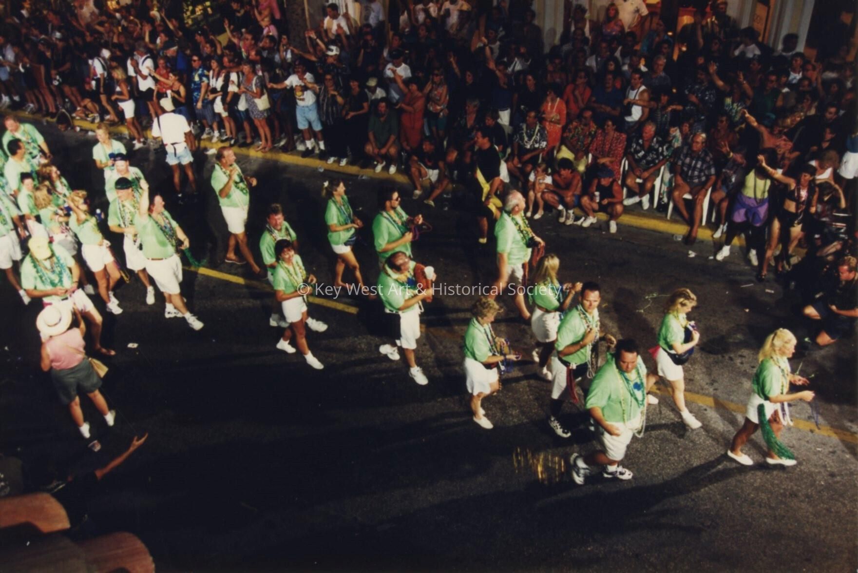 A group of unknown people in the parade.