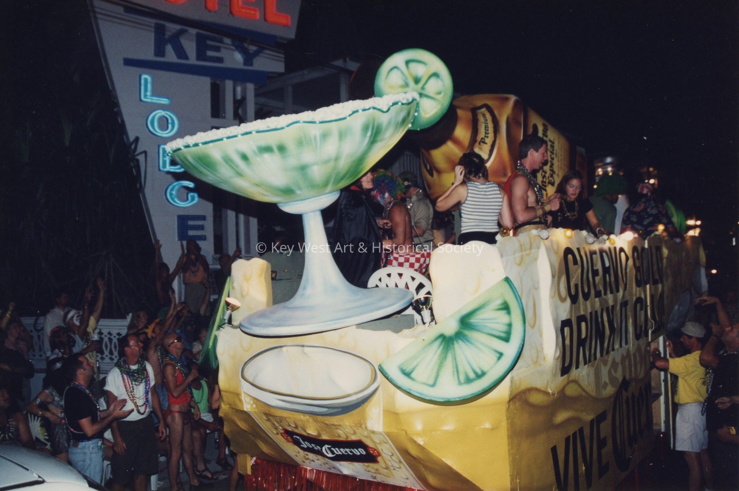 A float in the parade that reads Jose Cuervo.