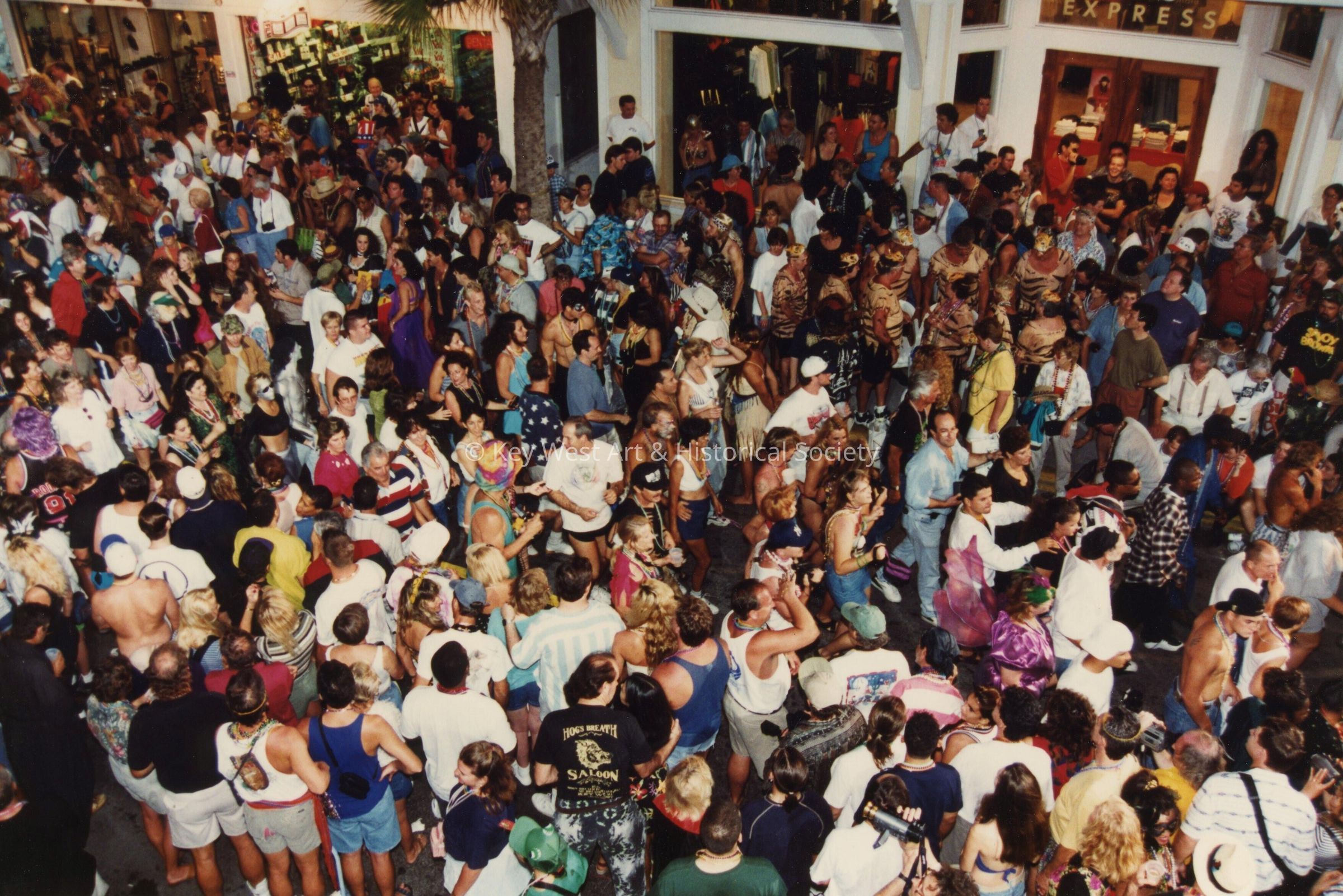 A huge group of unknown people in the street.