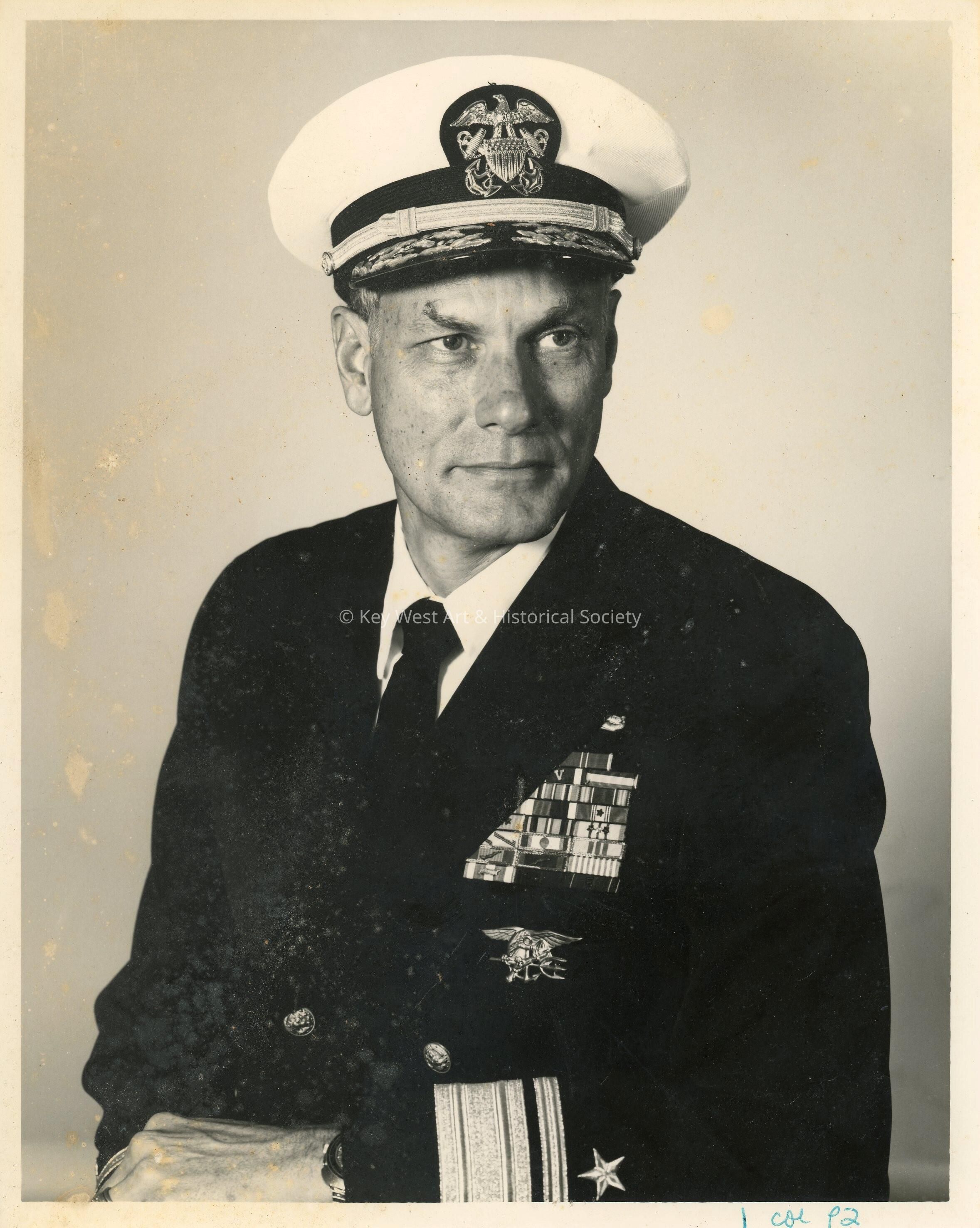 A photograph of a man in the U.S. Navy