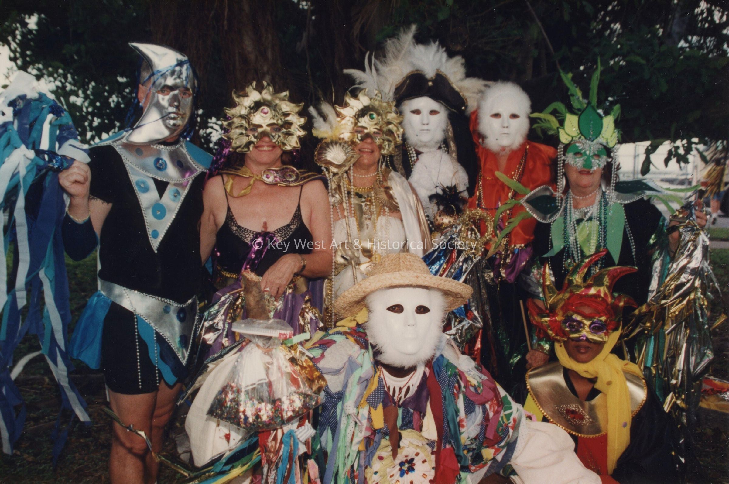 A group of unknown people dressed up.