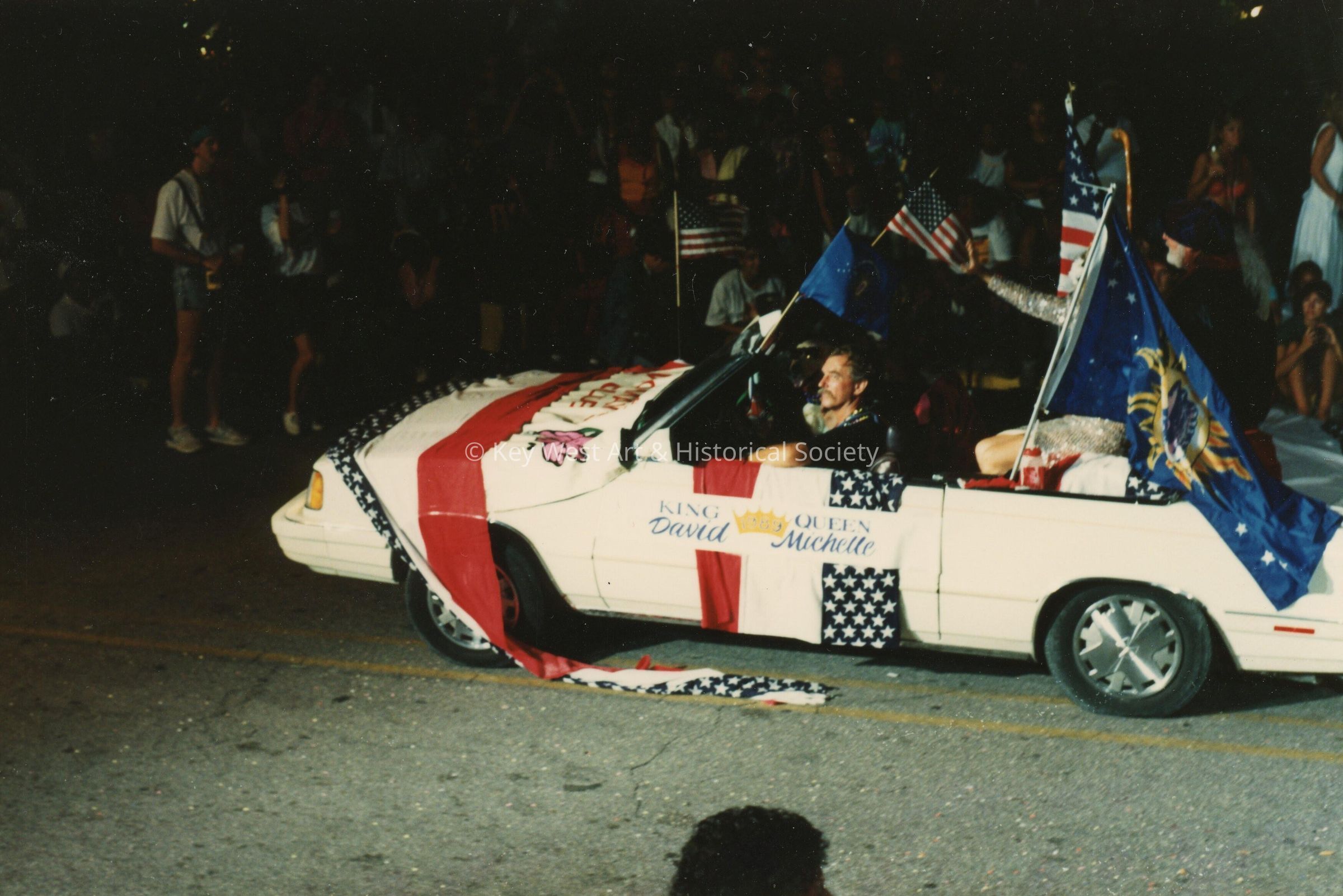 A float in the parade that reads King David and Queen Michelle.