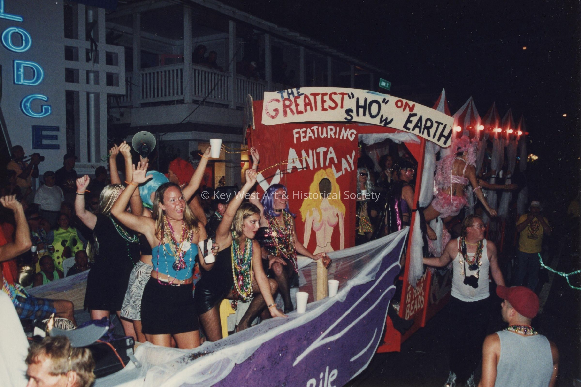 A float in the parade that reads the greatest show on earth.