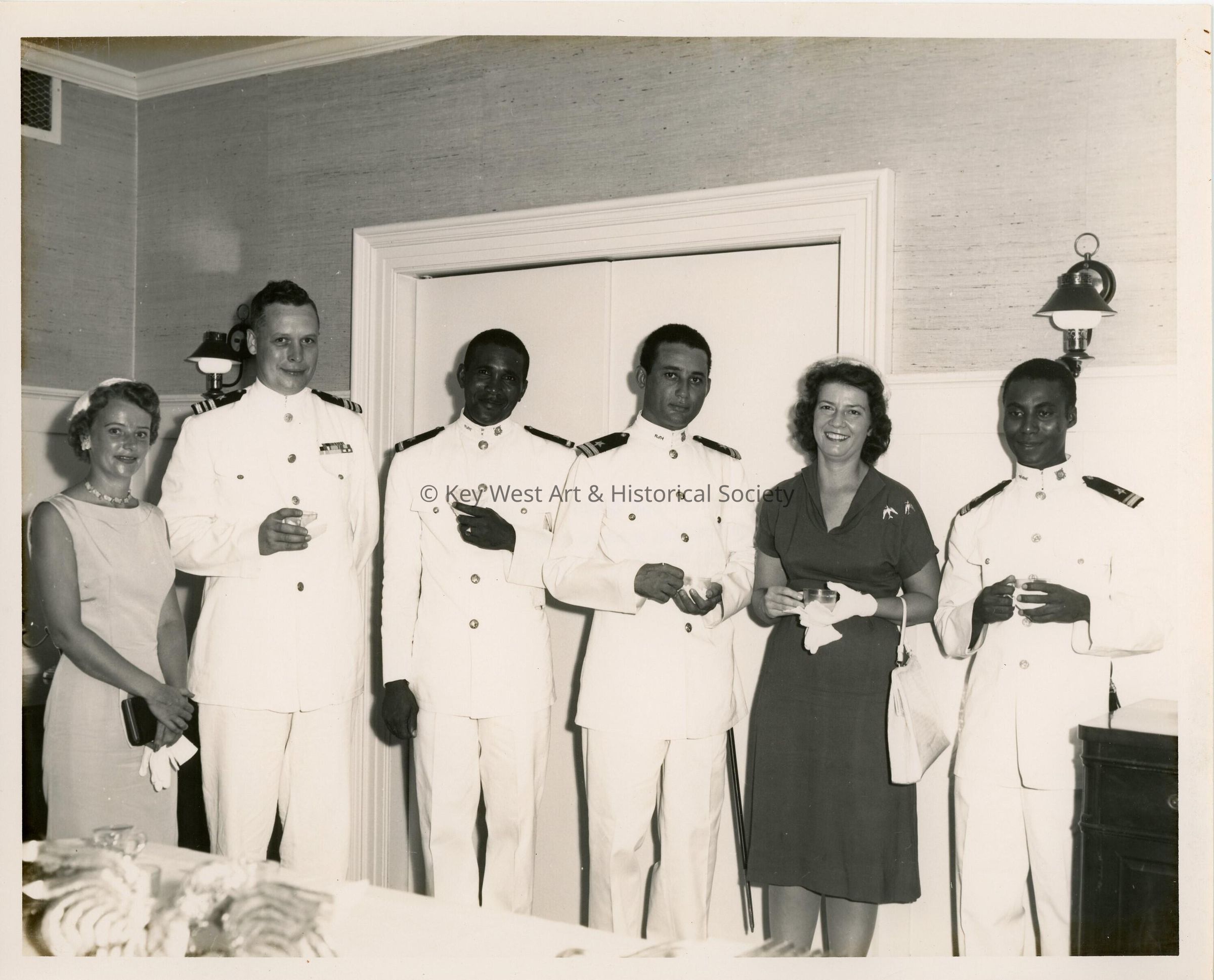 A group of unknown people at a party