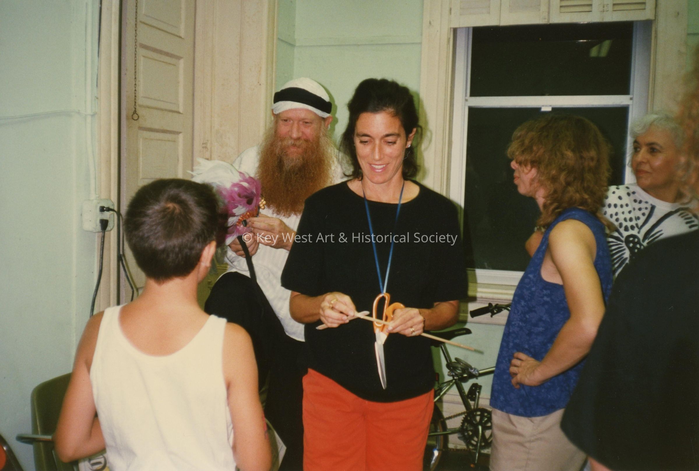 A group of unknown people talking.