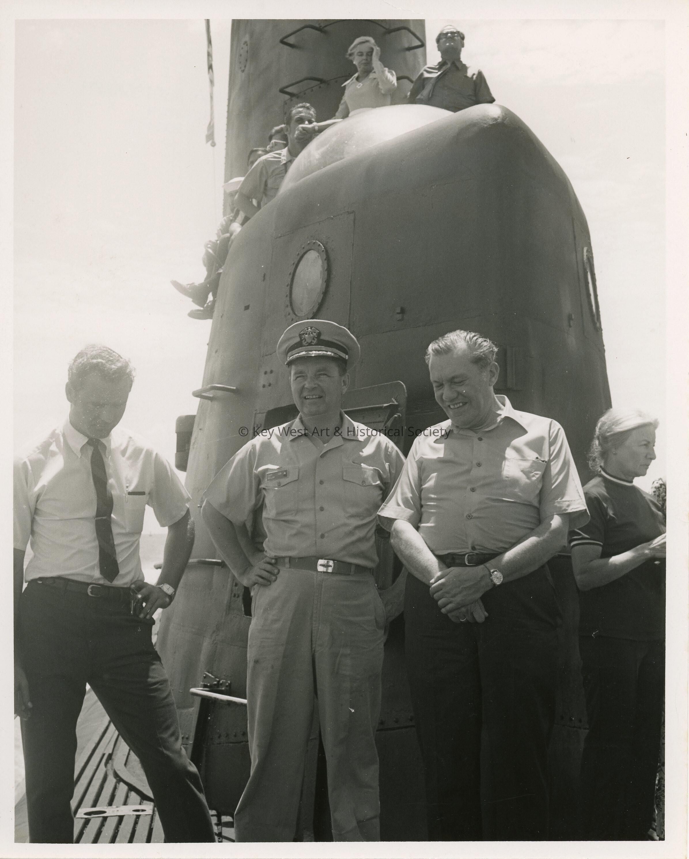 A group of unknown people on a ship