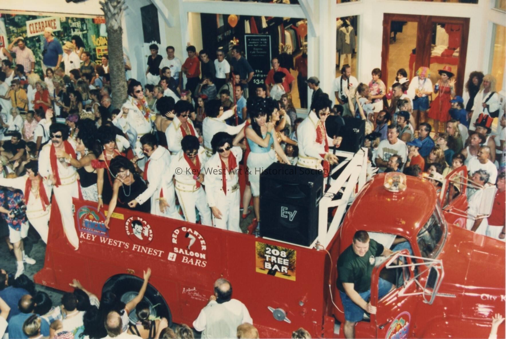 A float with unknown people on it during the parade.