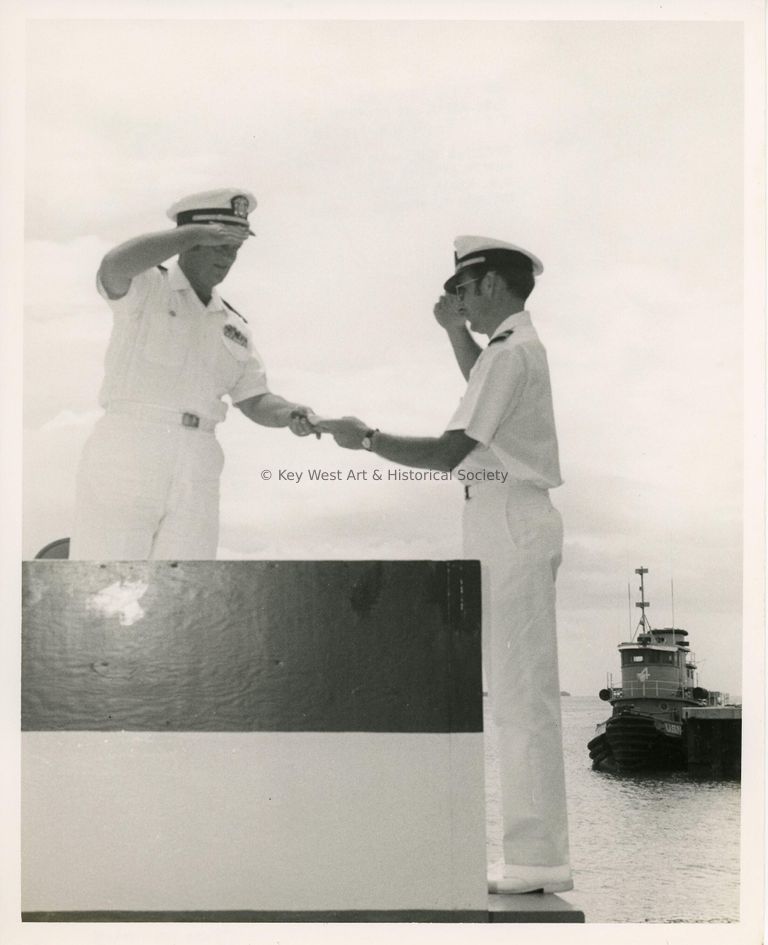 2 Men in uniform shaking hands