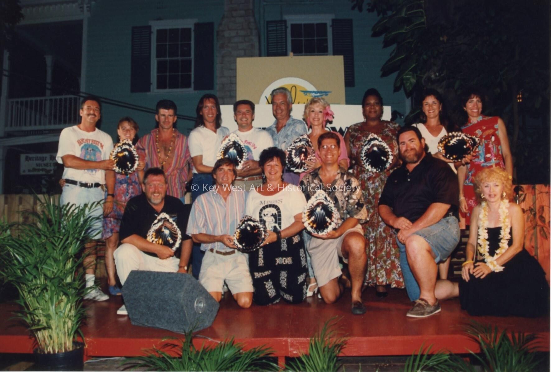A group of unknown people at the awards ceremony.