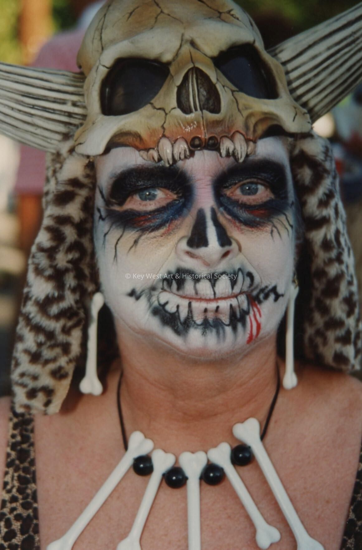 An unknown person with their face painted.
