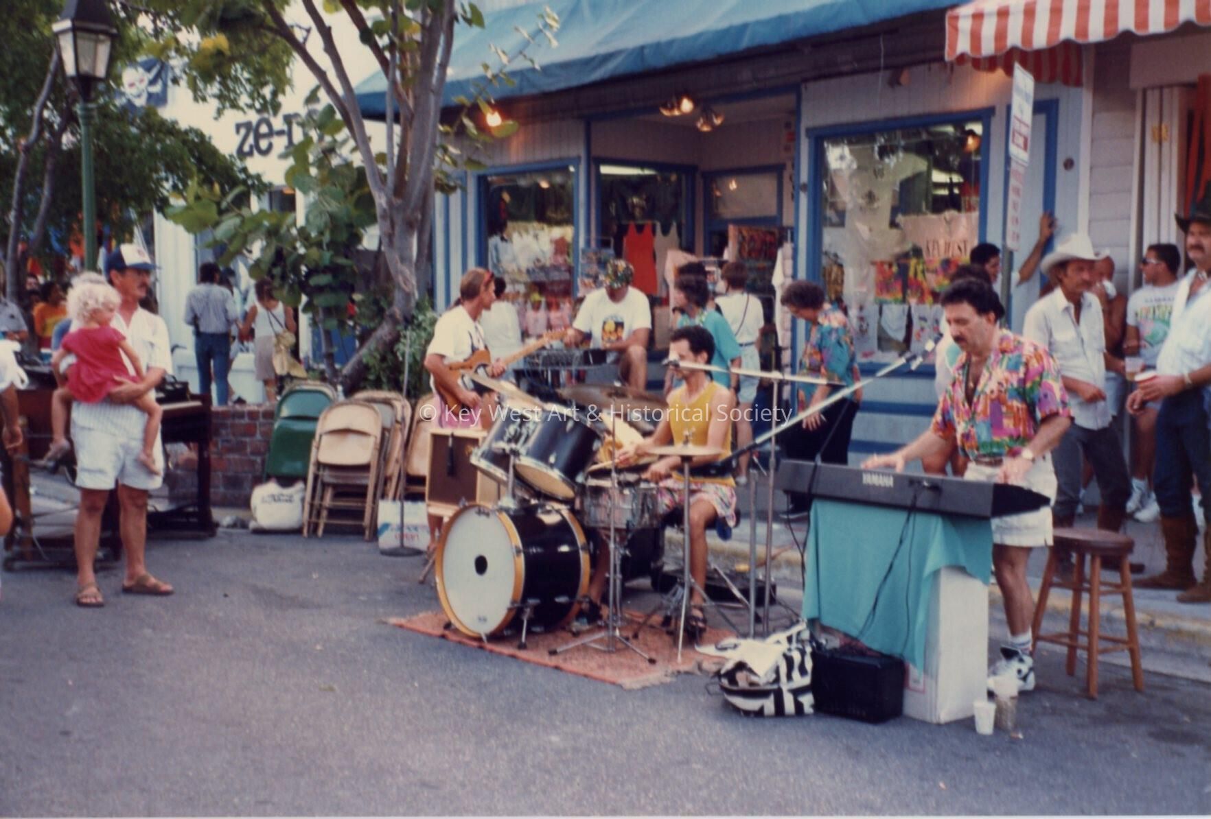 A band playing in front of a store on Duval Street.