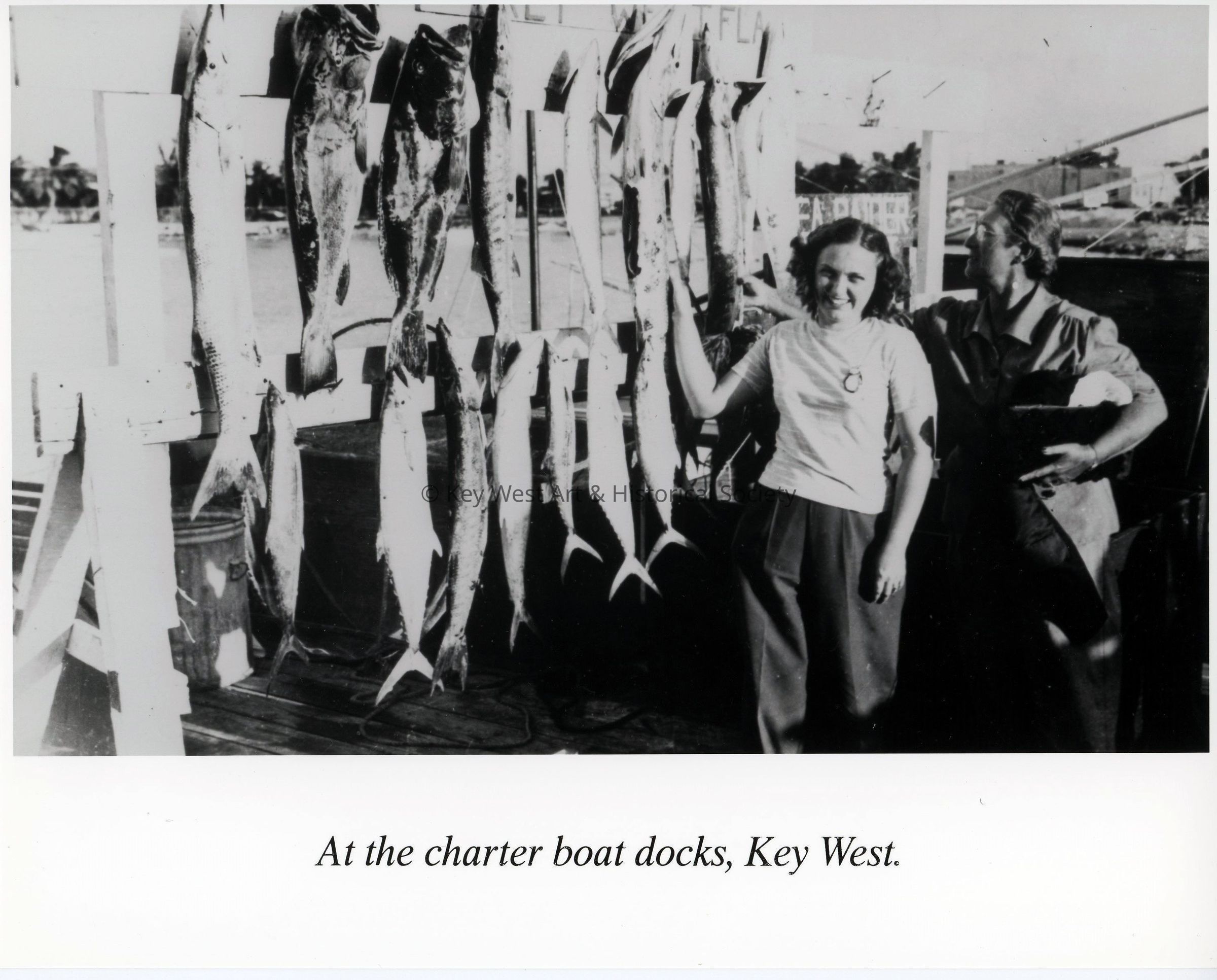 At the Charter Boat Docks, Key West; © Key West Art & Historical Society