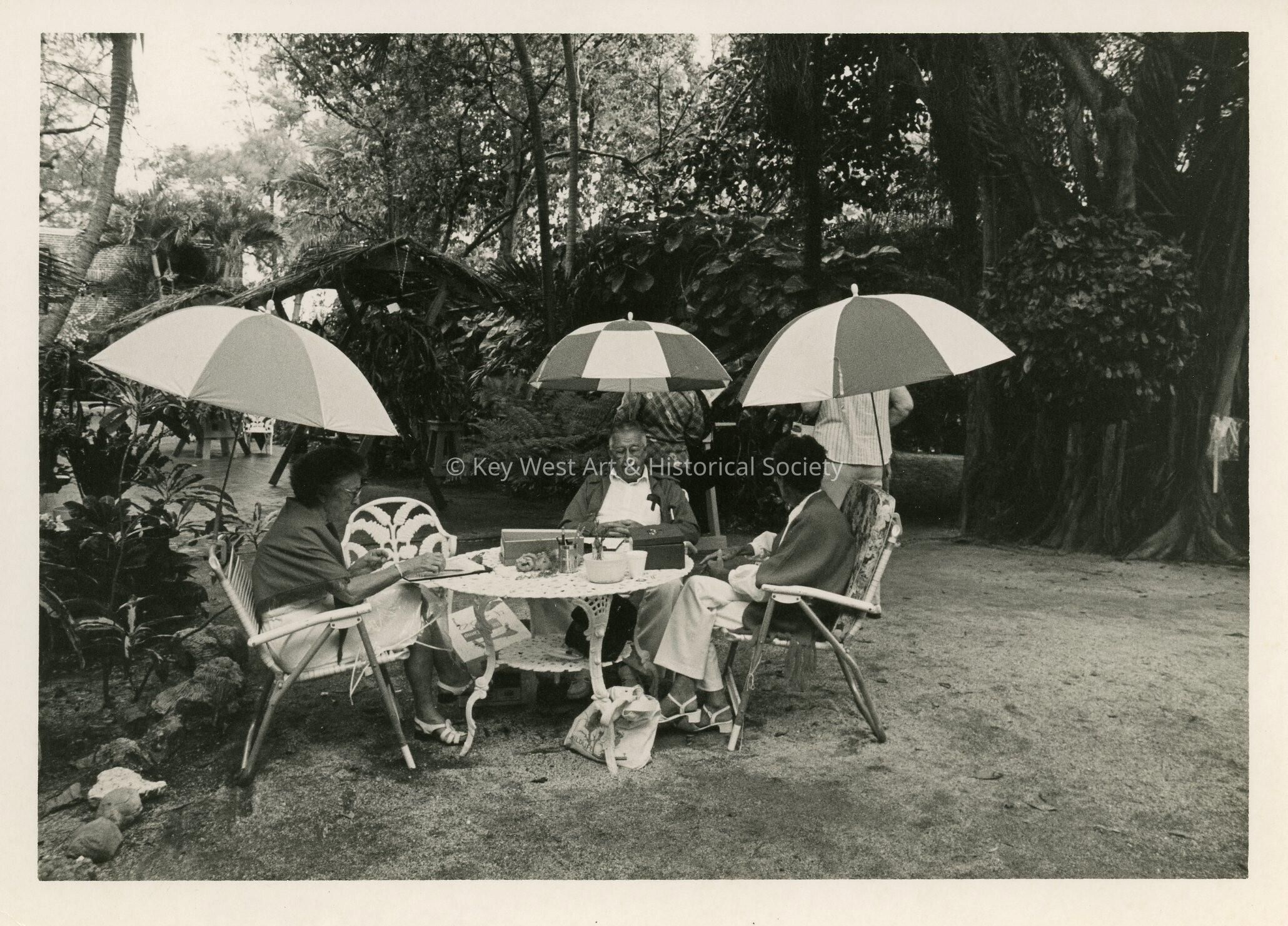 An unknown group of people sitting at a table