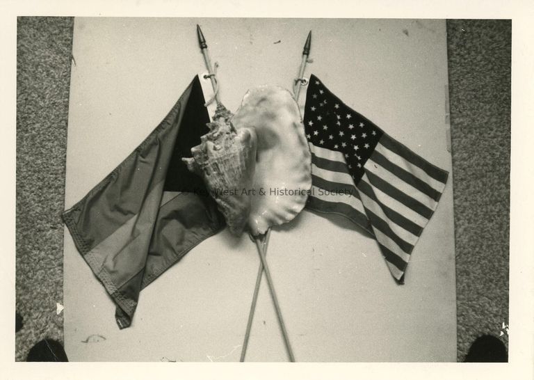 2 Flags and a conch shell