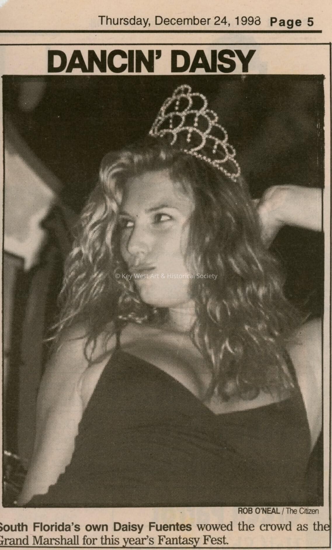 A picture of Daisy Fuentes the grand marshal in the Key West Citizen.