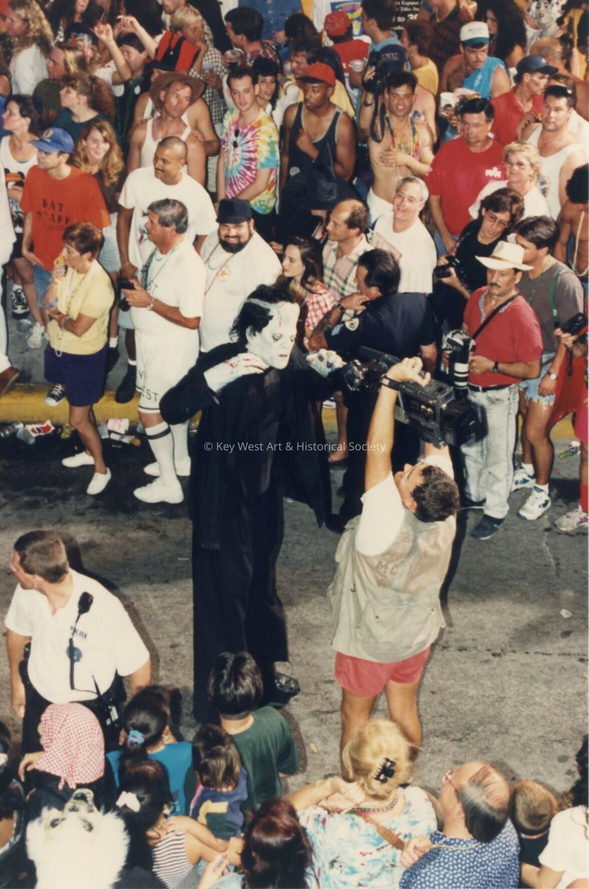 An unknown man dressed up walking down Duval Street during the parade.