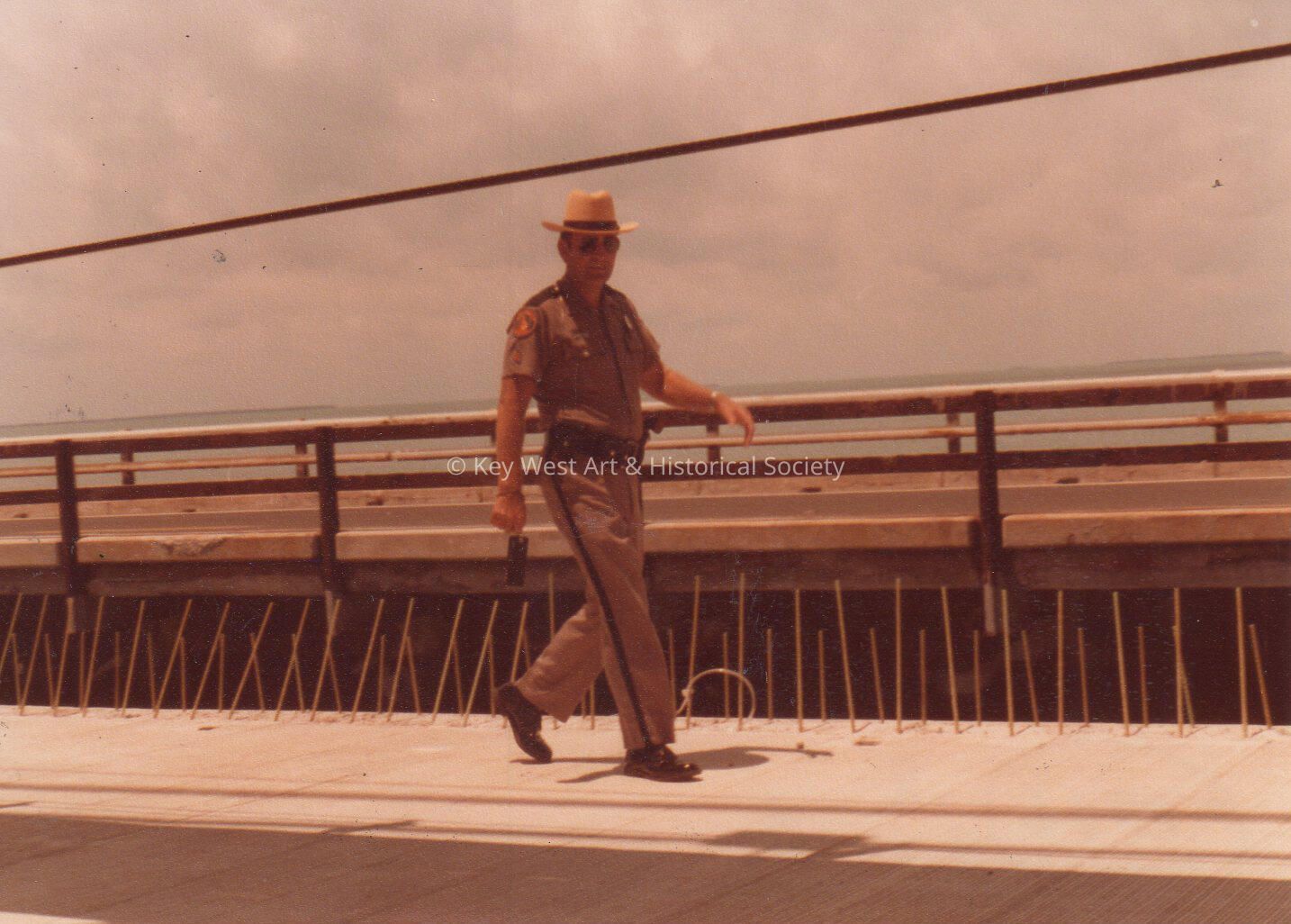 A sheriff on a bridge