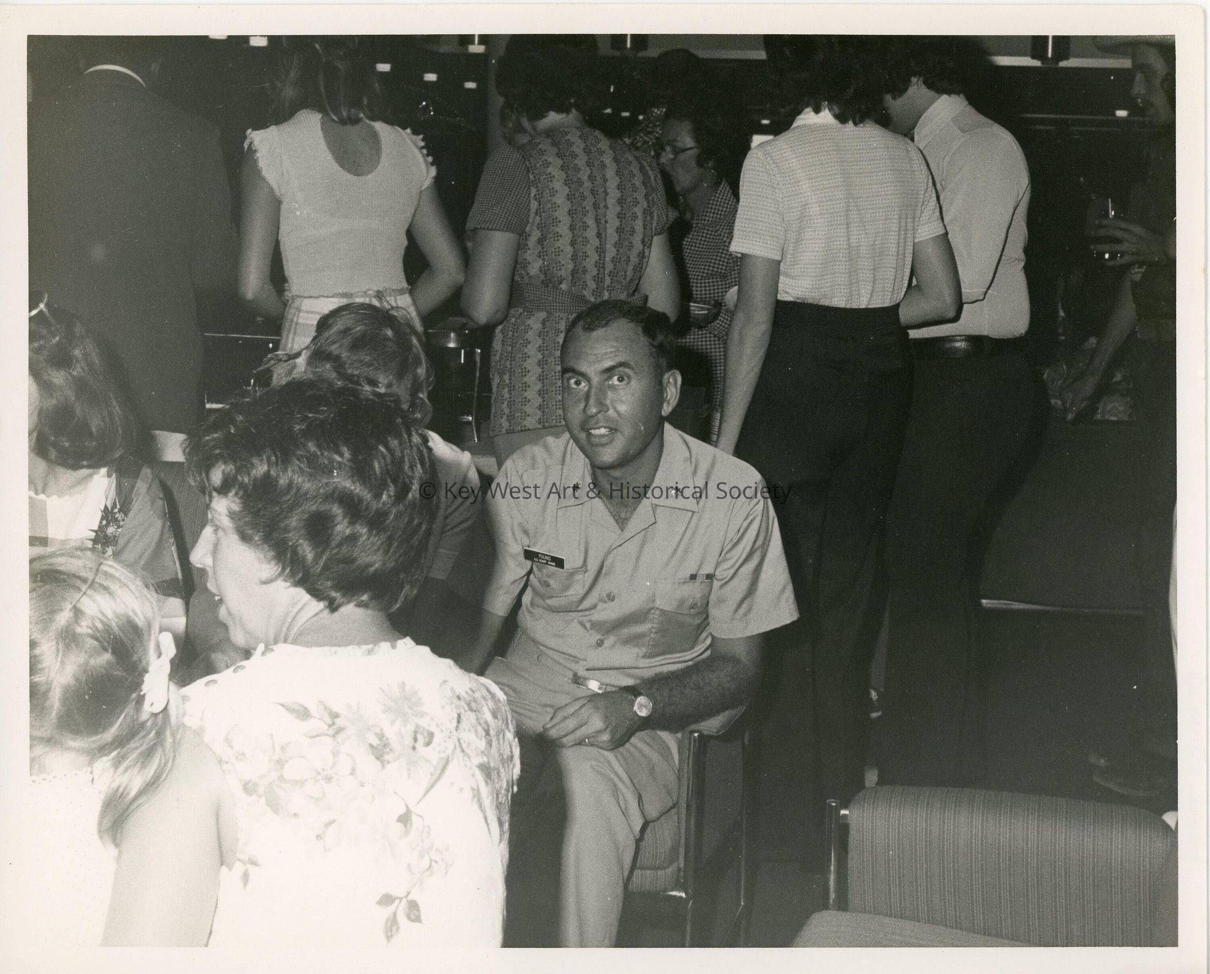 An unknown man in uniform at a party