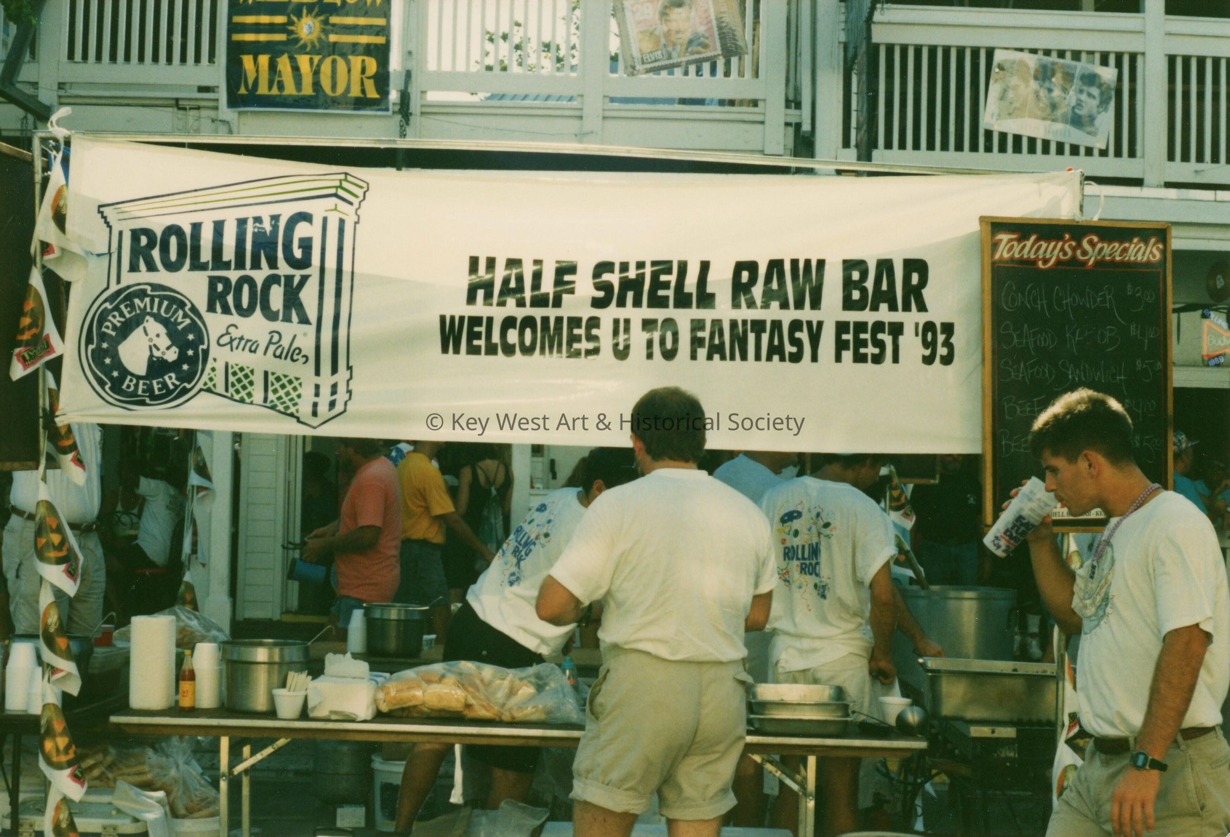 A sign that reads Half shell raw bar welcomes you to FF 93.