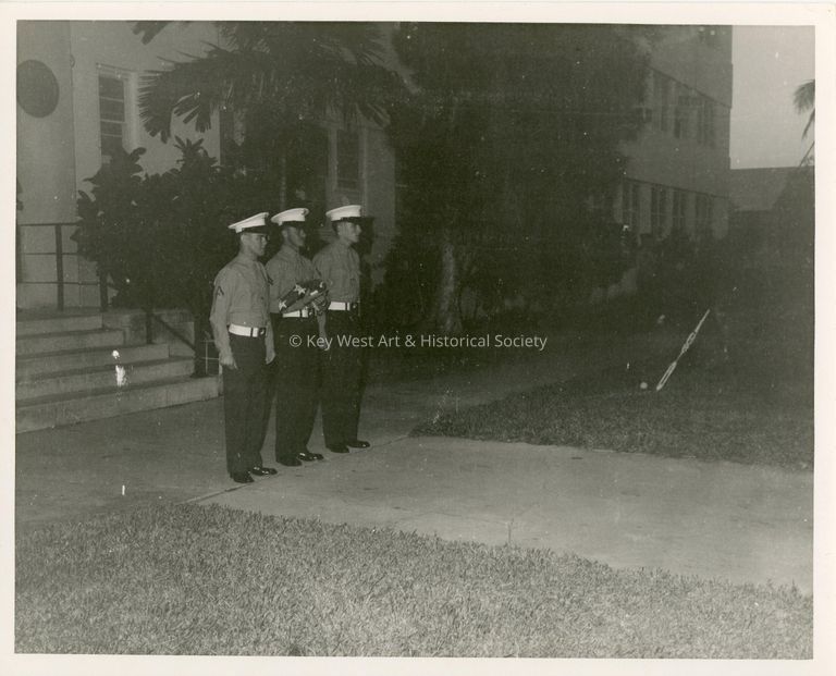 3 Unknown men in uniform