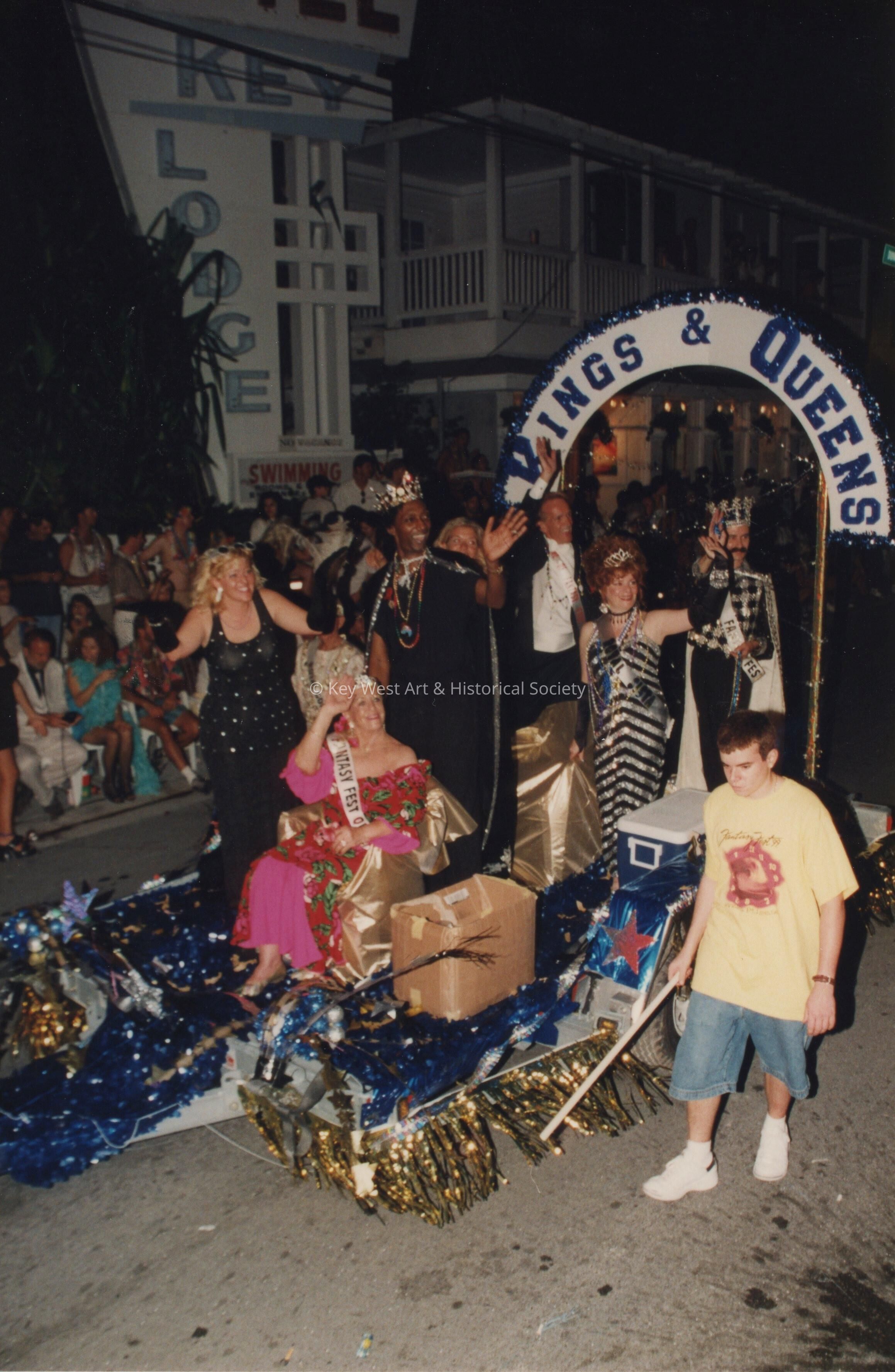 A float in the parade with Kings and Queens from previous years.