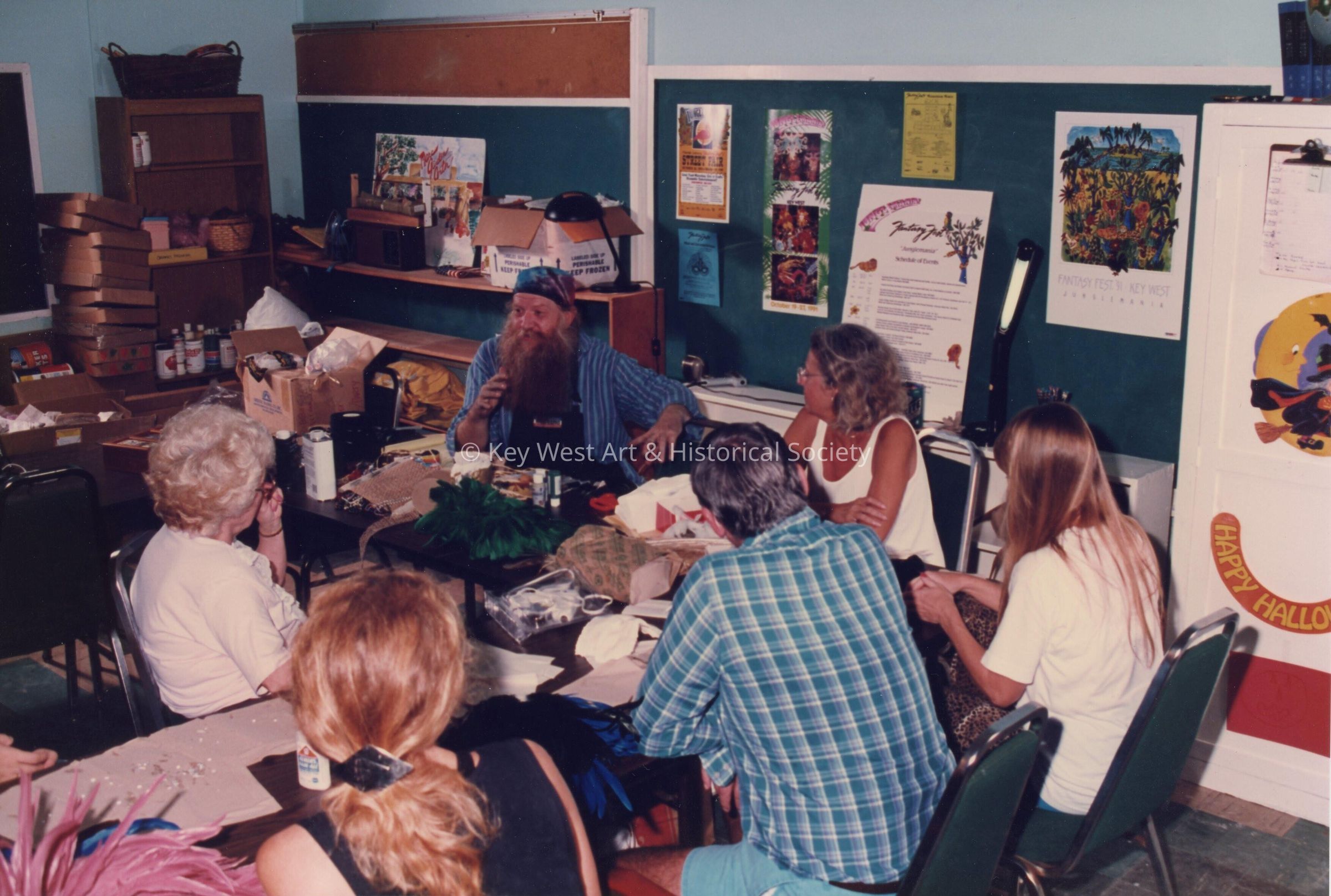 A group of unknown people making face masks.