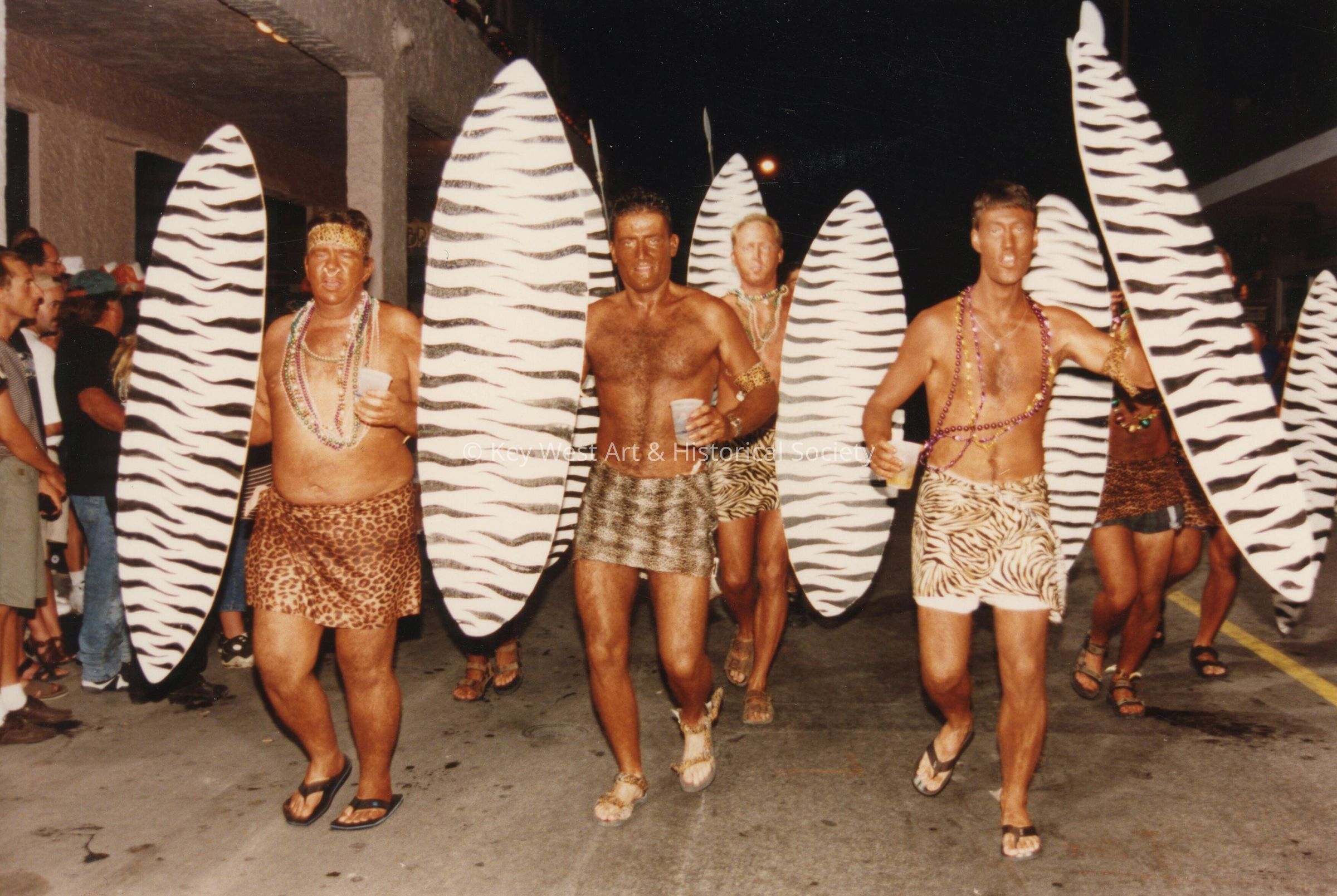 A group of unknown people dressed up.