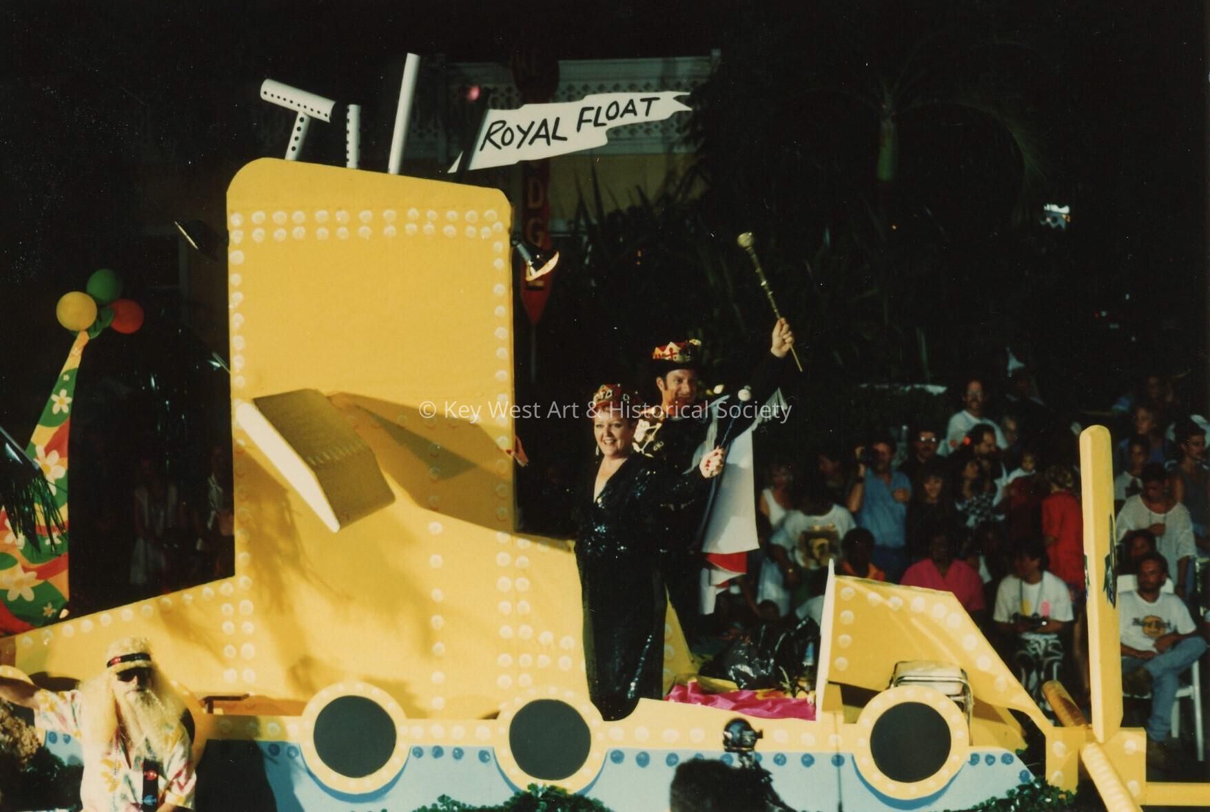 A float in the parade that reads Royal Float.
