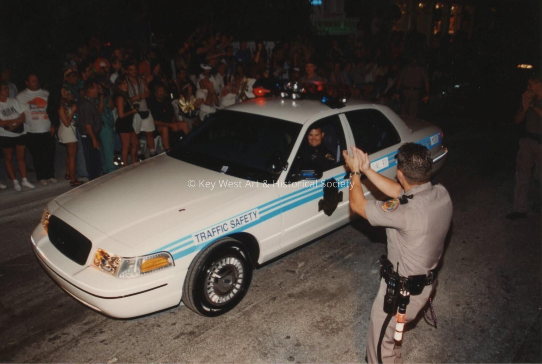 A cop car in the parade.