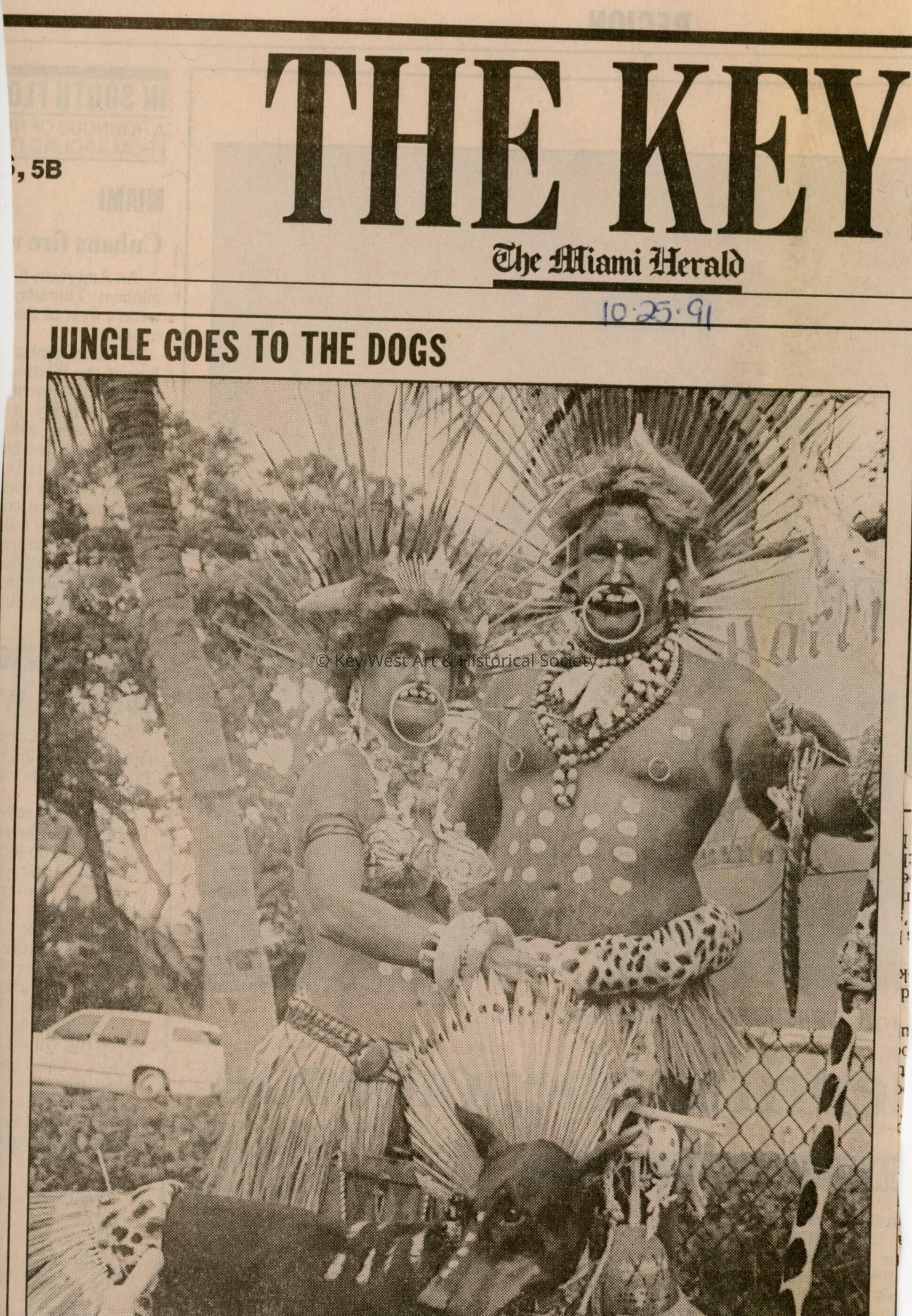 A picture and a caption that reads Jungle goes to the dogs in the Miami Her