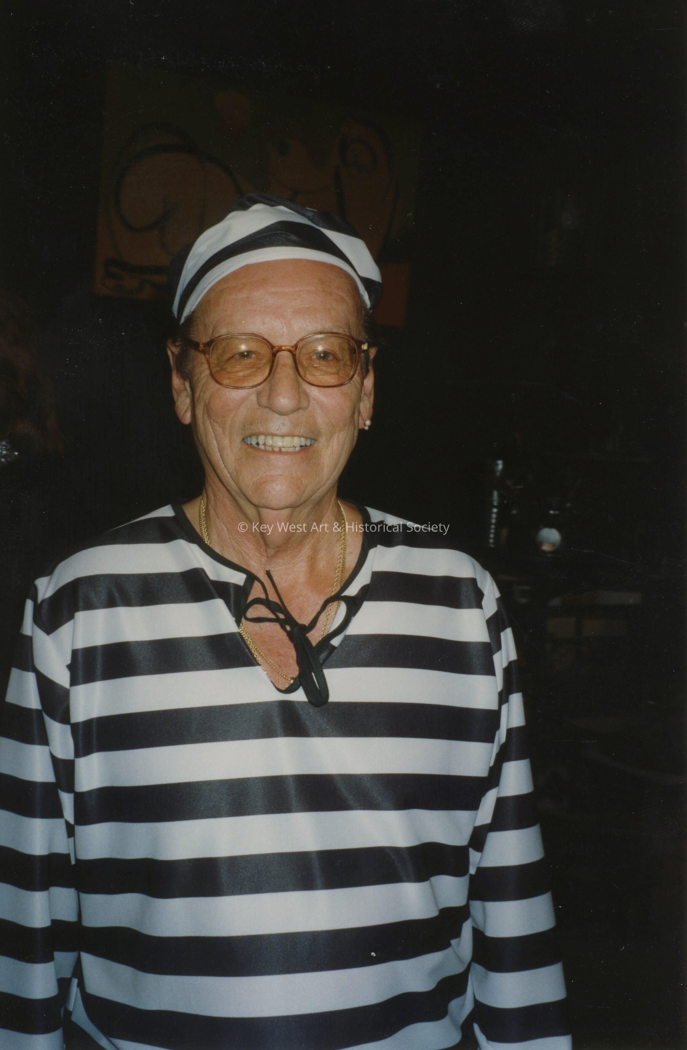An unknown man dressed up.