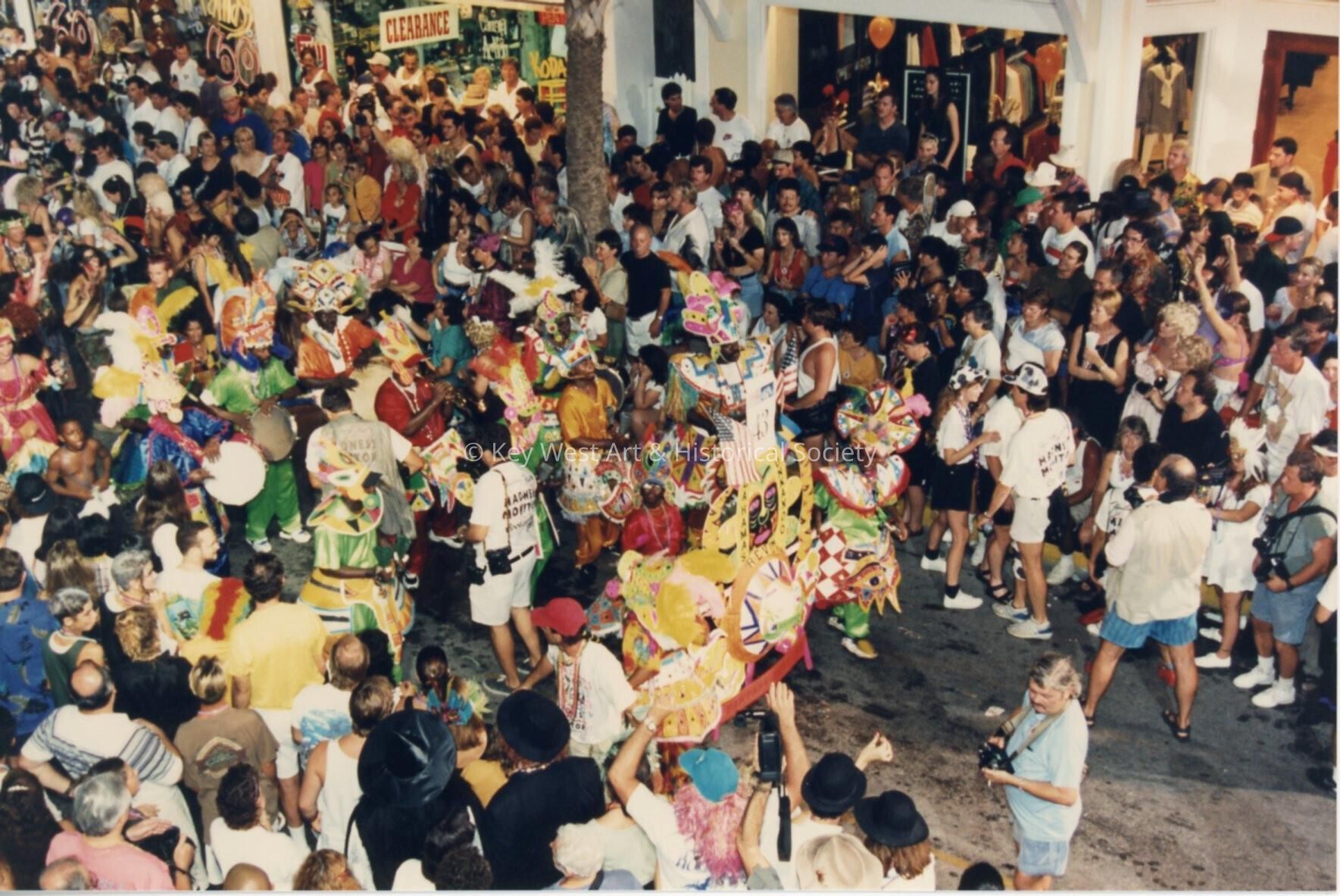 A group of people in the street during the parade.