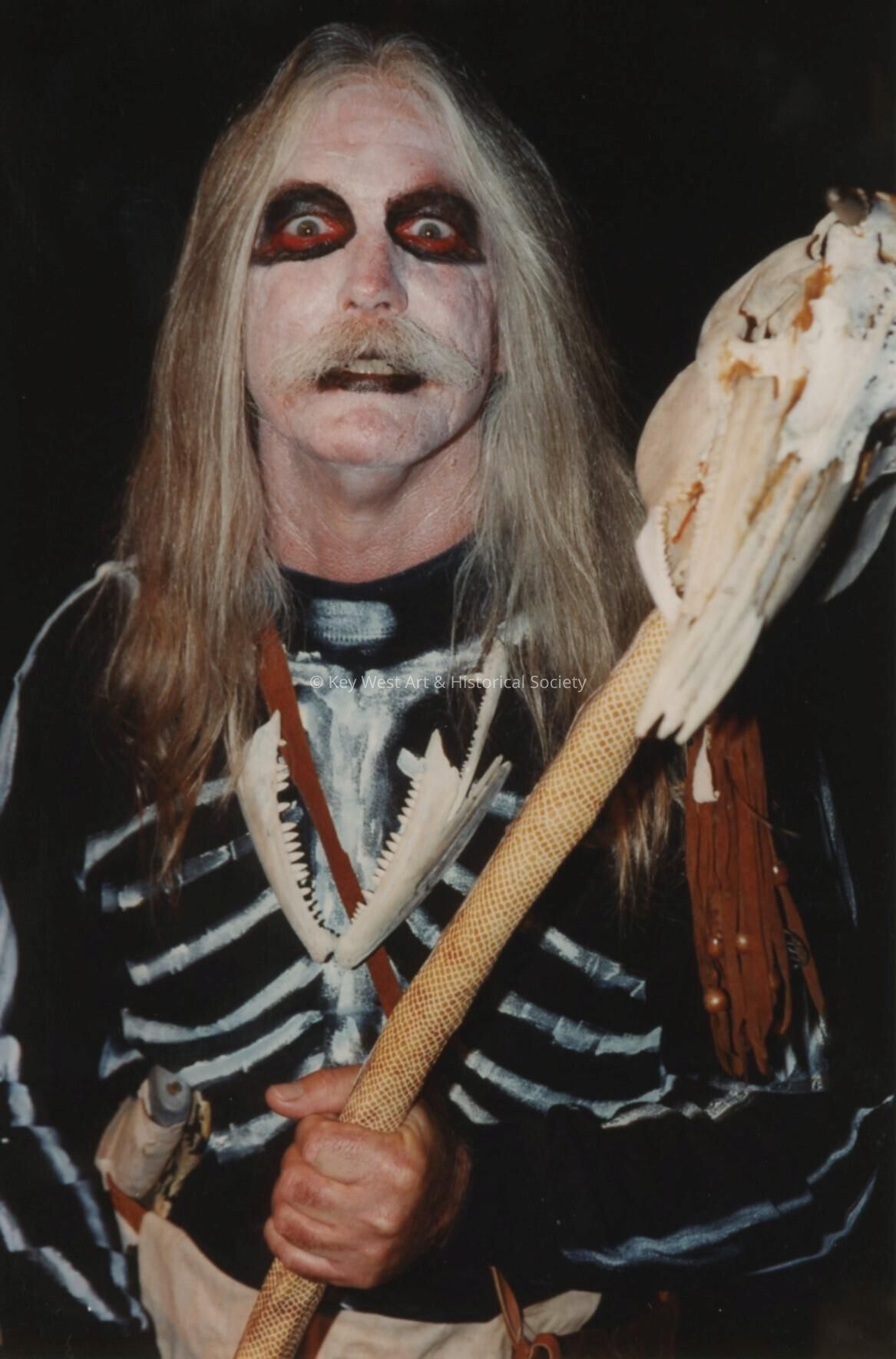 An unknown man dressed up.